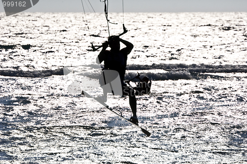 Image of kitesurfer  silhouette