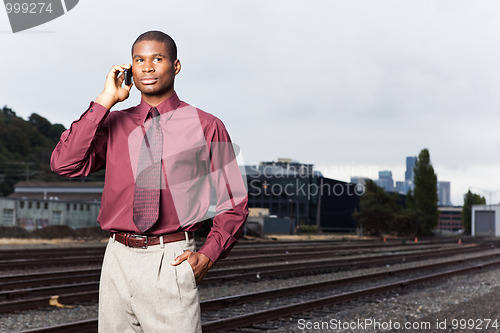 Image of Black businessman on the phone