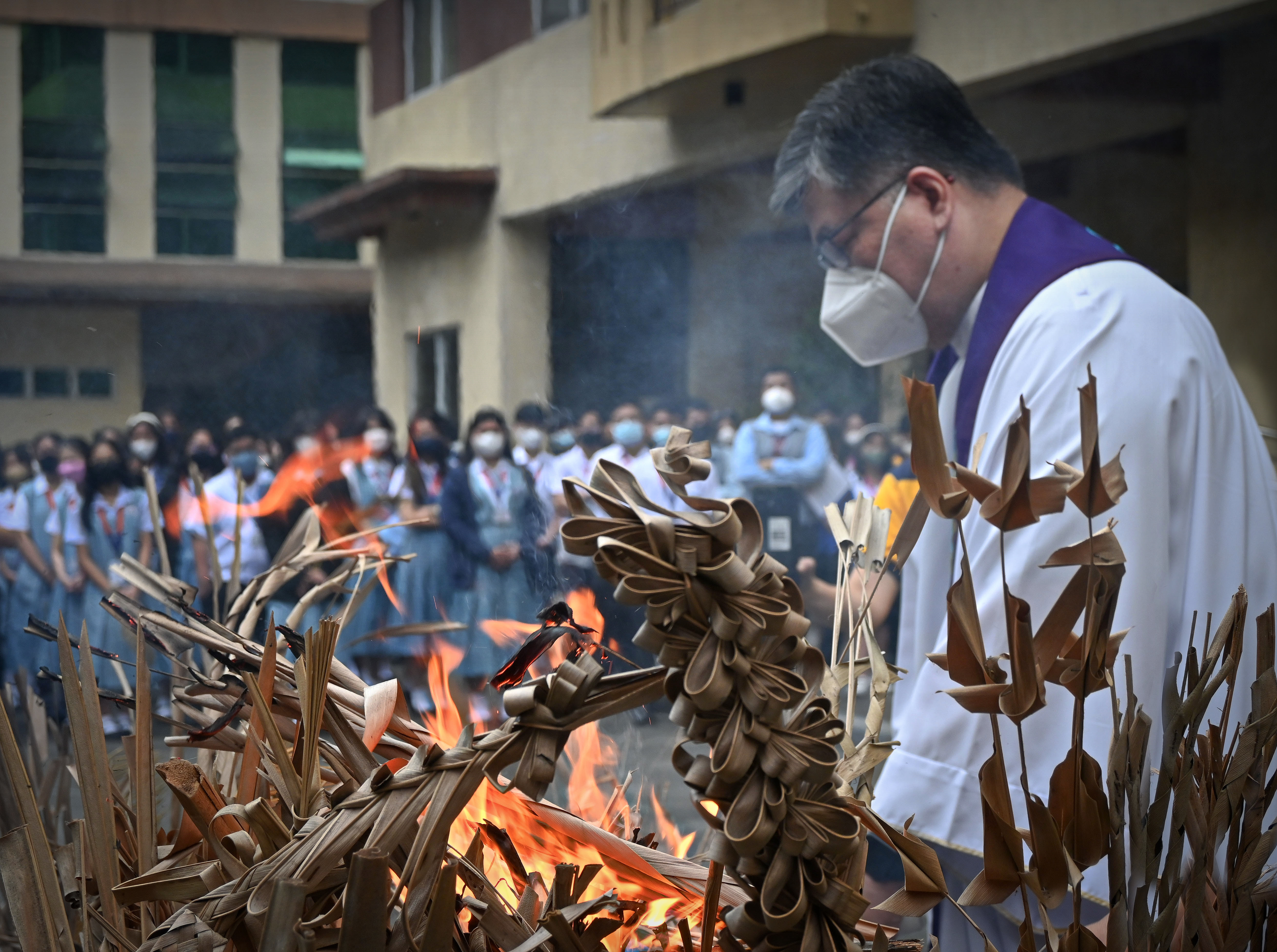 The Blessing and burning of palms to ashes officiated by Rev. Fr. Nolan A. Que. The burning of palms is a sign of mourning and penance. It is a preparation for our Lenten journey. It is also a reminde