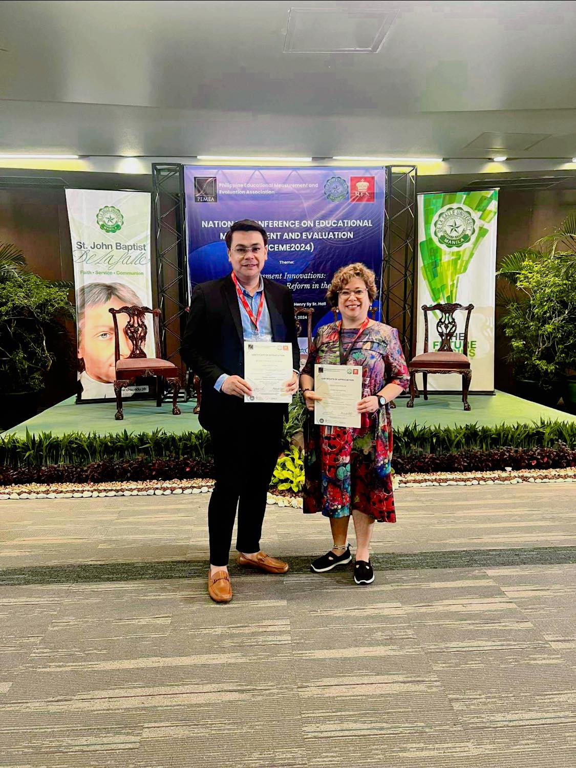 SPU Dumaguete's Kenneth Paul Duran and Irish Udtohan Shine at NCEME 2024 with Research on Assessment Innovations