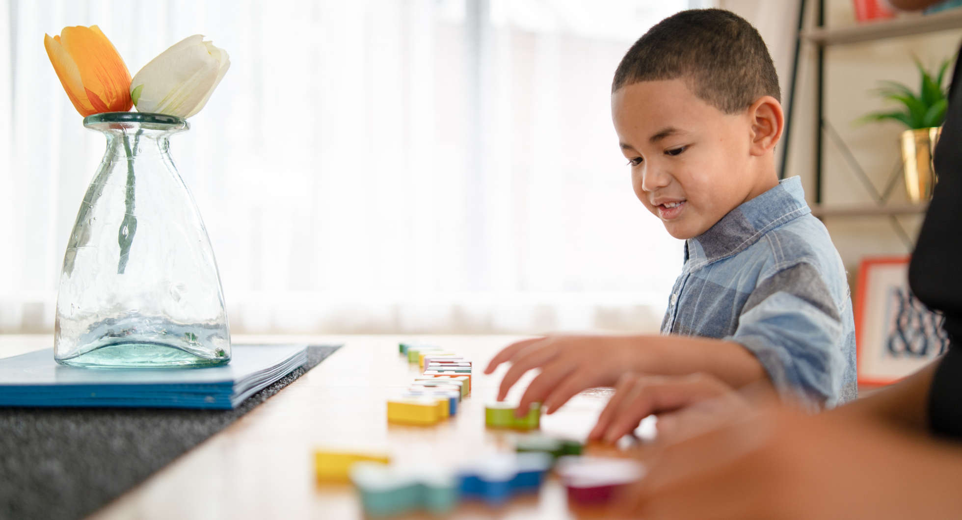 Child playing and learning with blocks