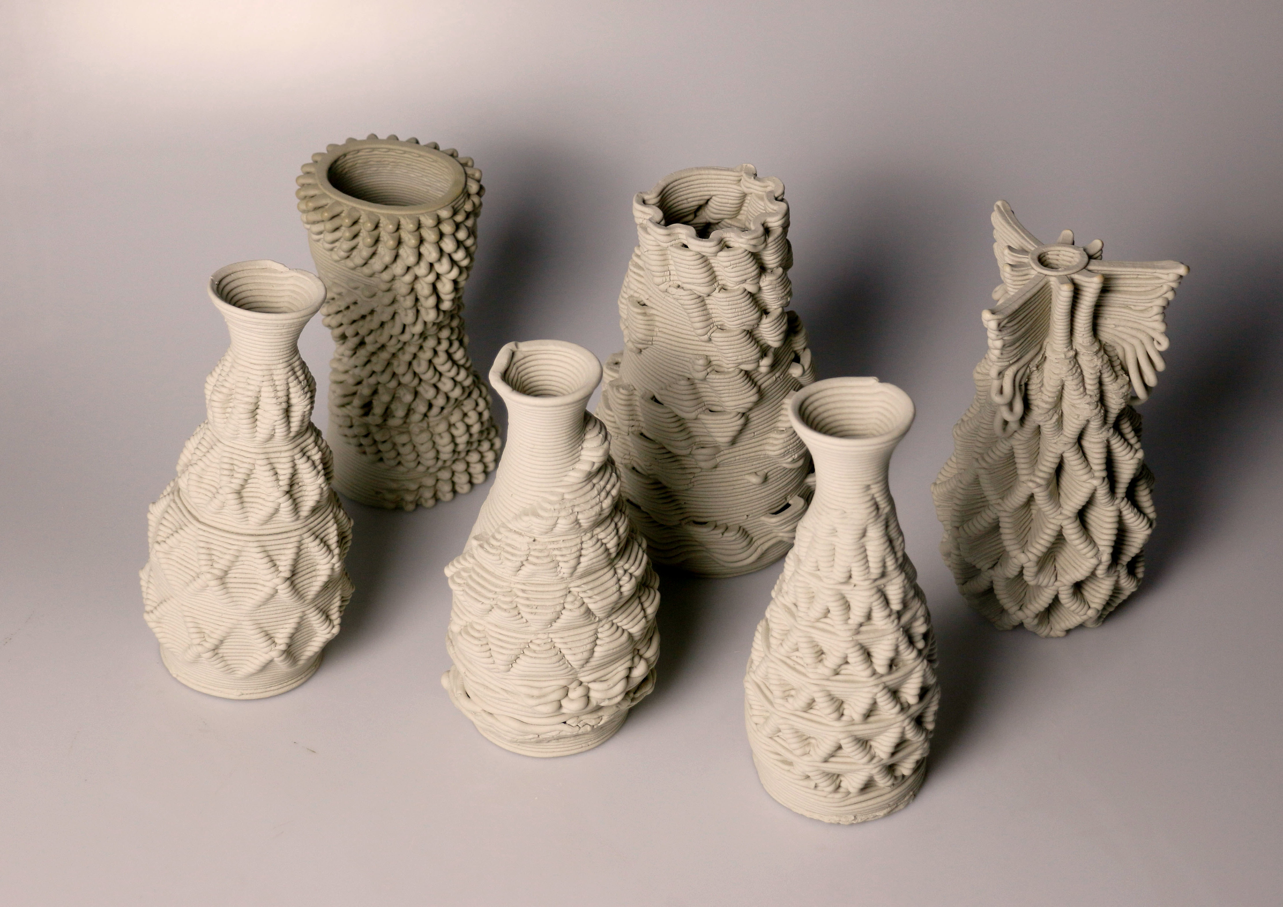 six 3d printed ersatz pinchpot ceramic vases