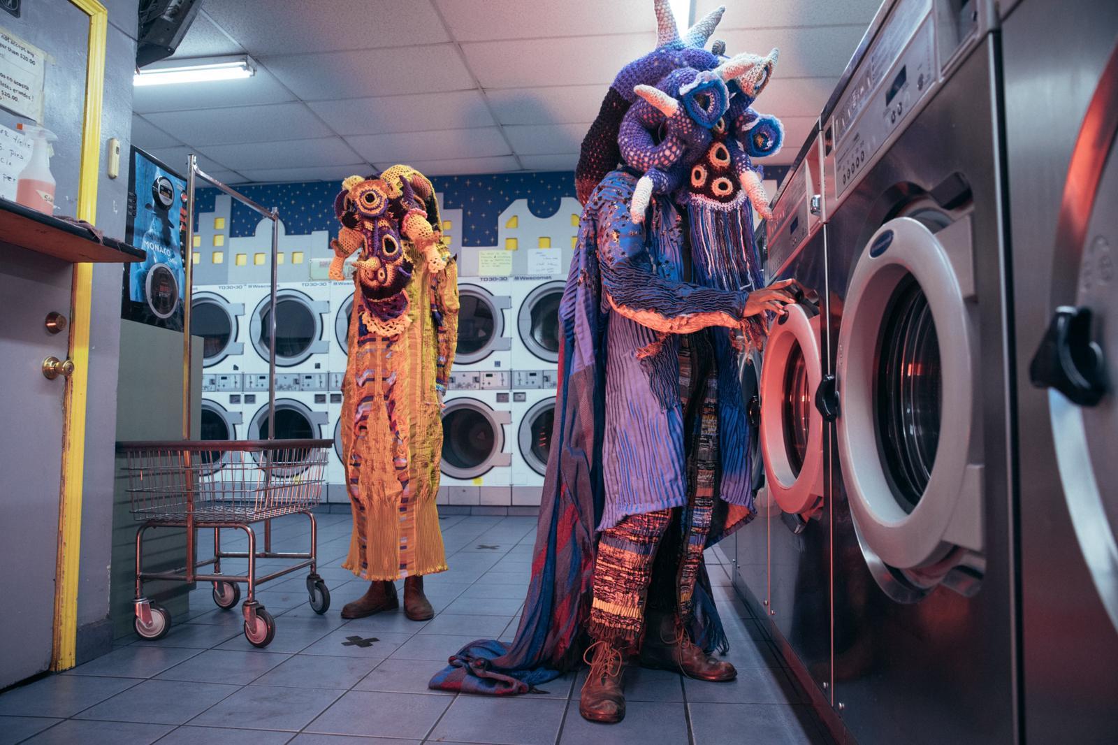 figures colorful costume laundromat