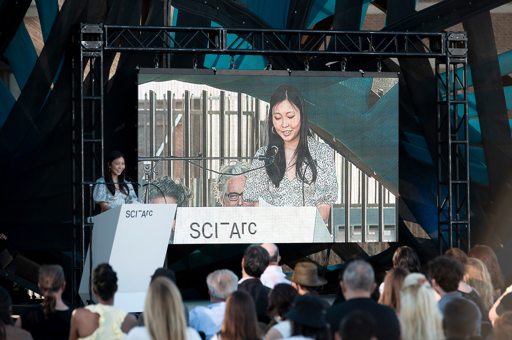 speech screen crowd podium