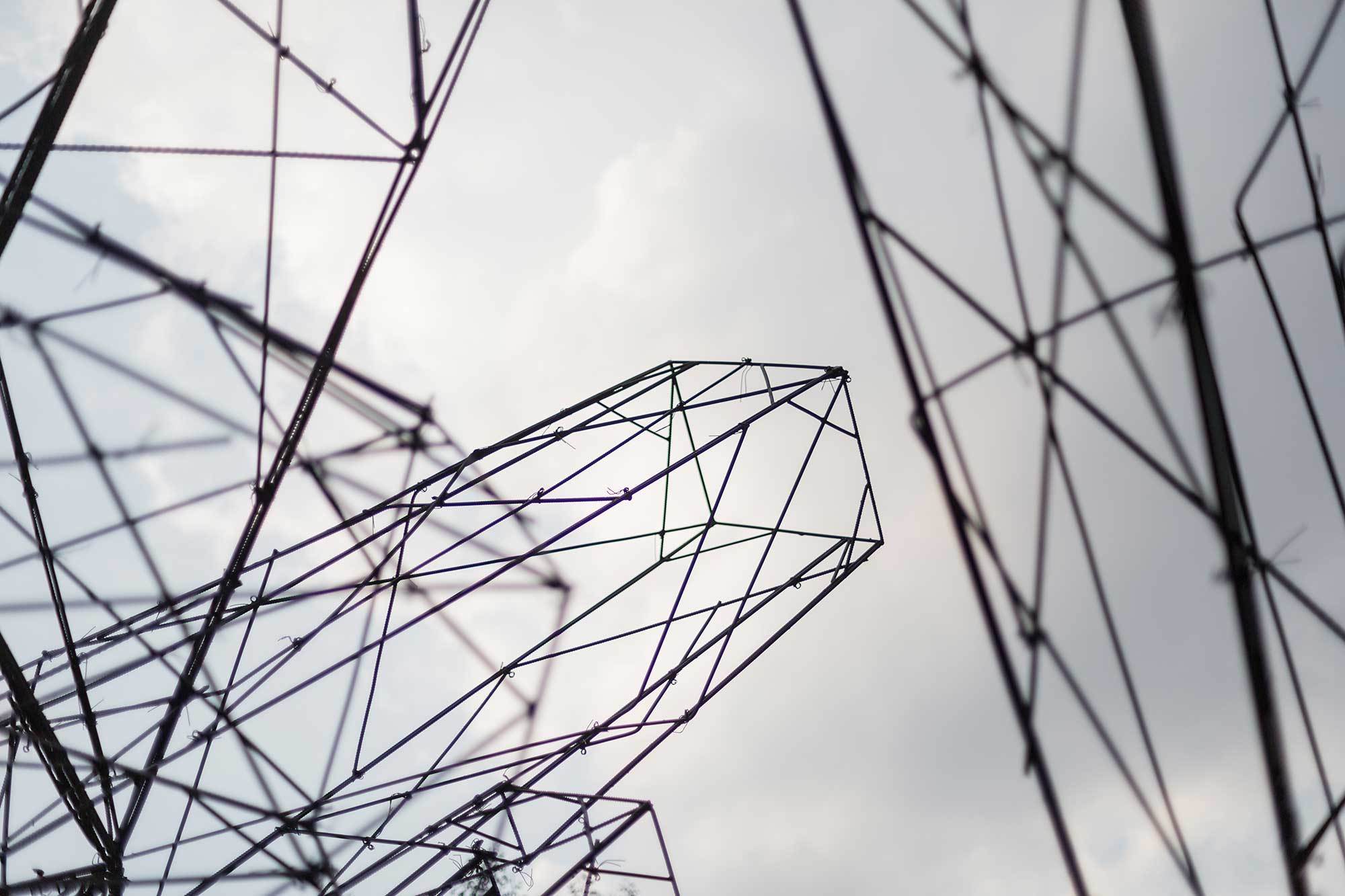 closeup of Pavilion made of black steel bars