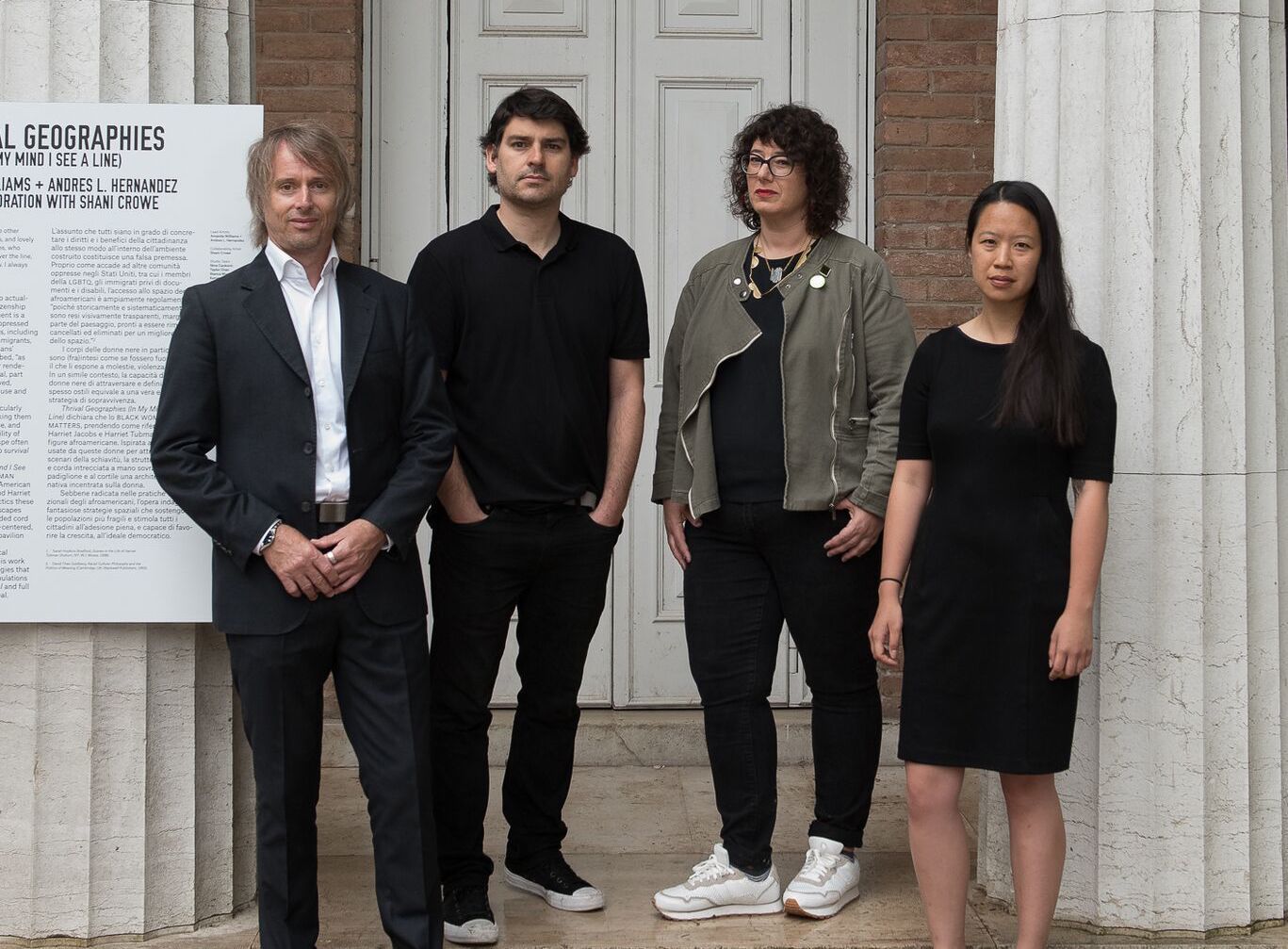 Curators standing in front of US pavilion at venice Architecture biennale