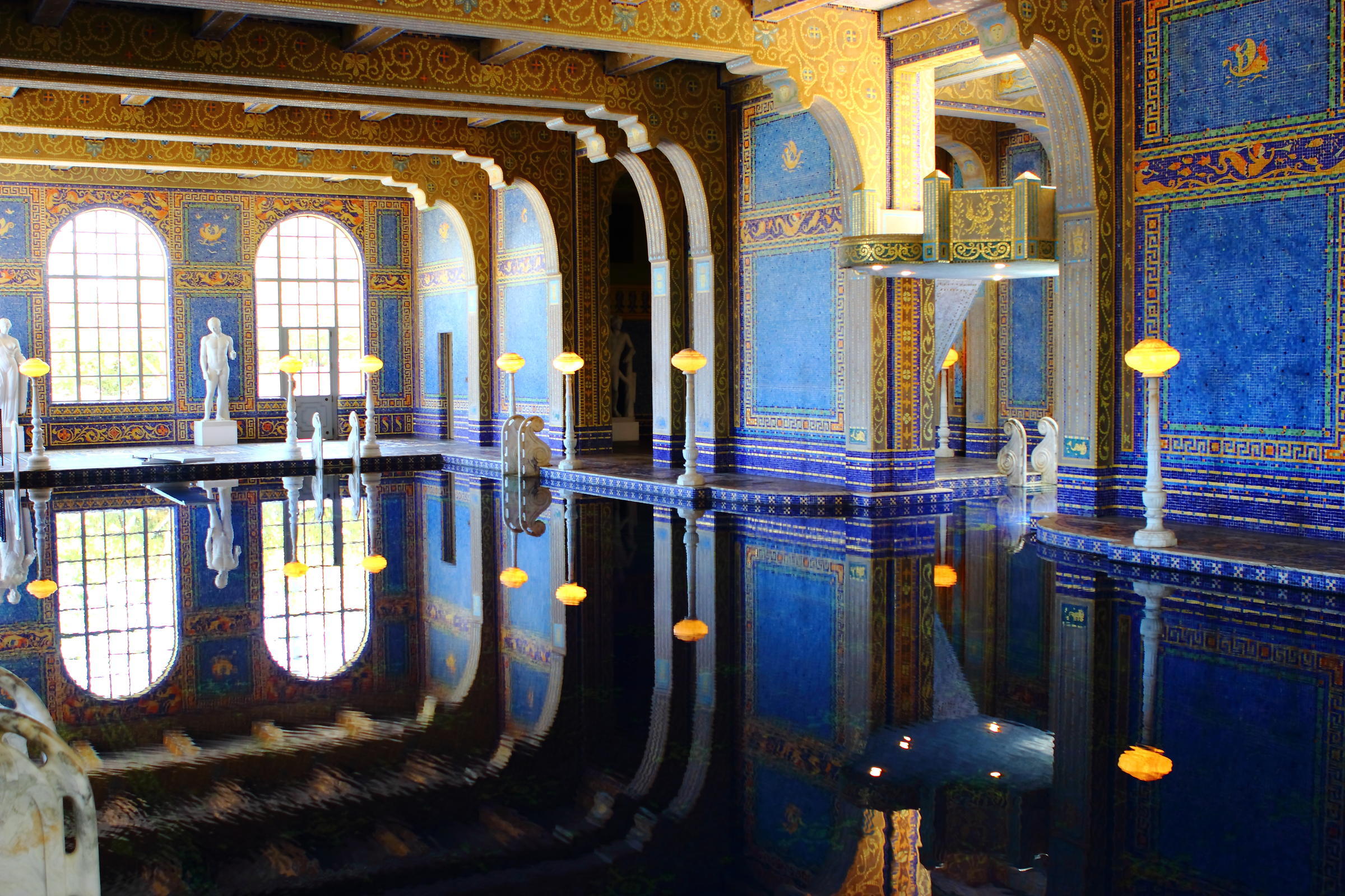 pool blue walls tile arches