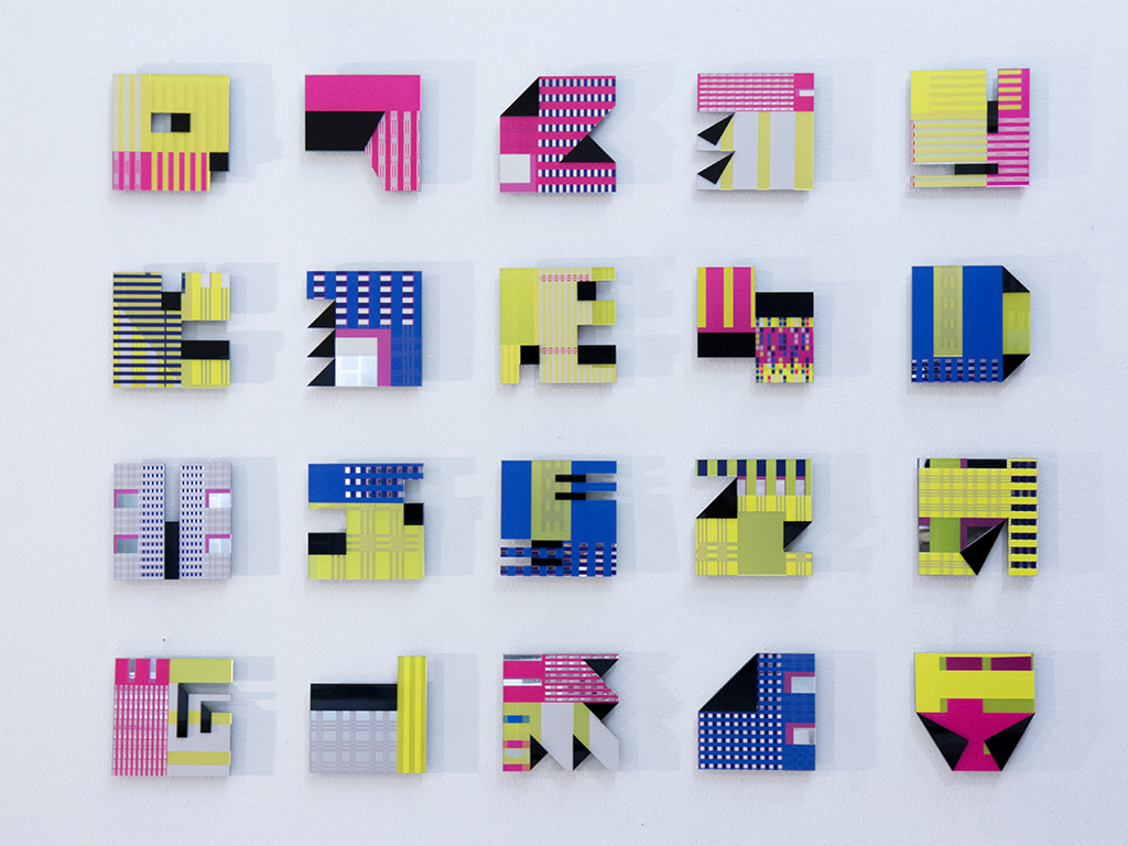 twenty small textured cubes by Elena Manferdini