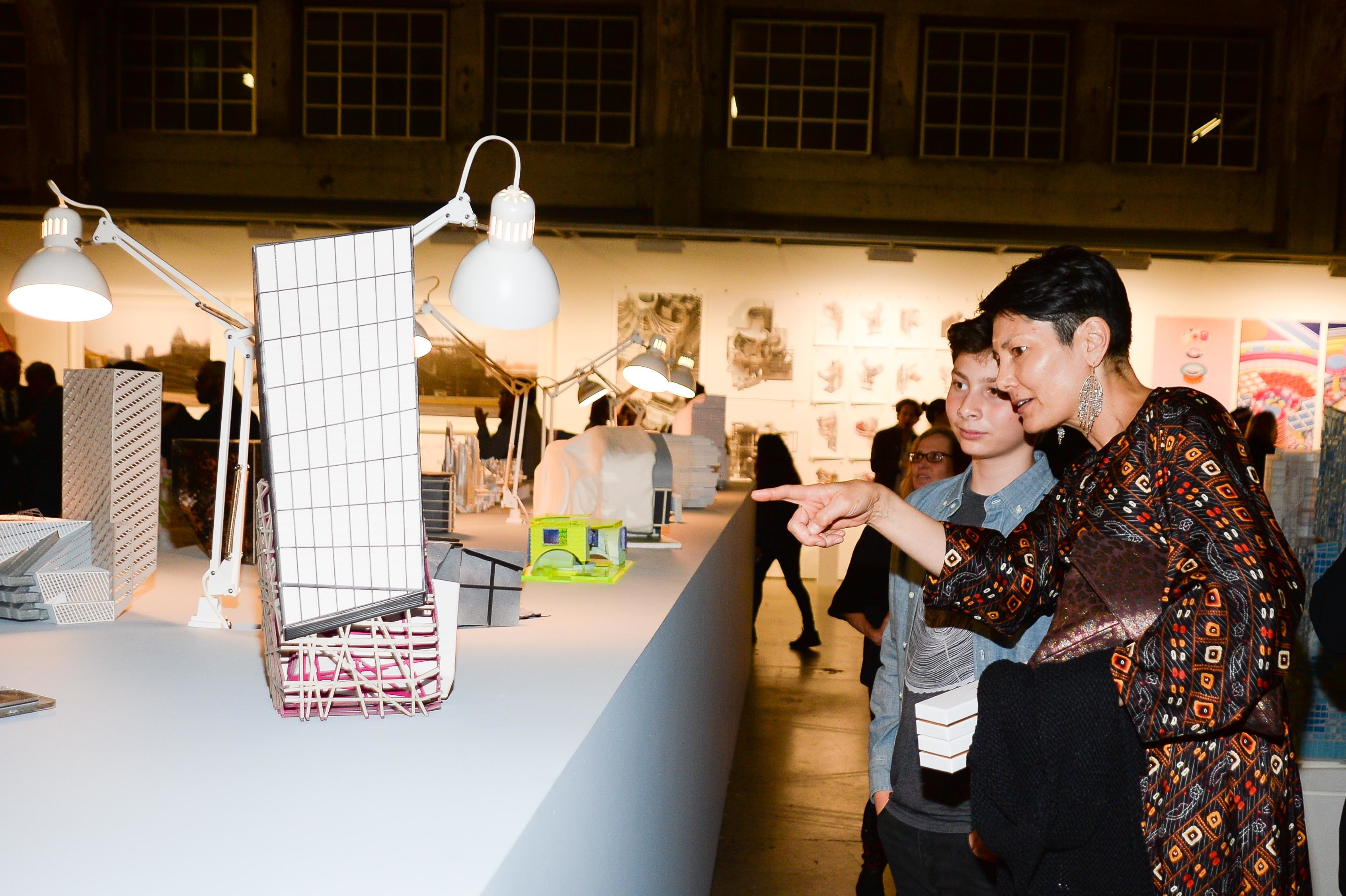 Architectural Enthusiasts admiring an architectural model