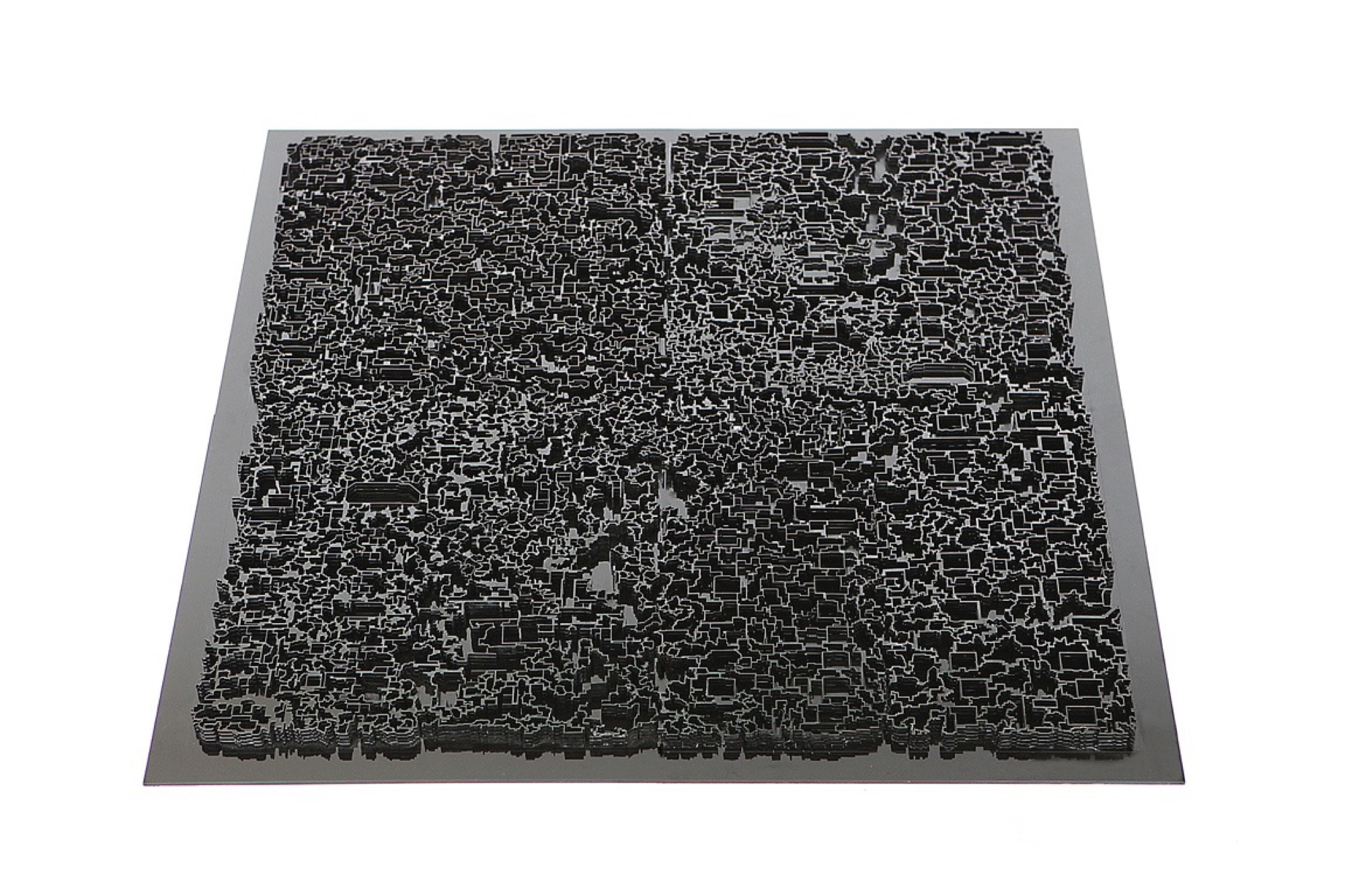 architecture model on a black square with extrusions