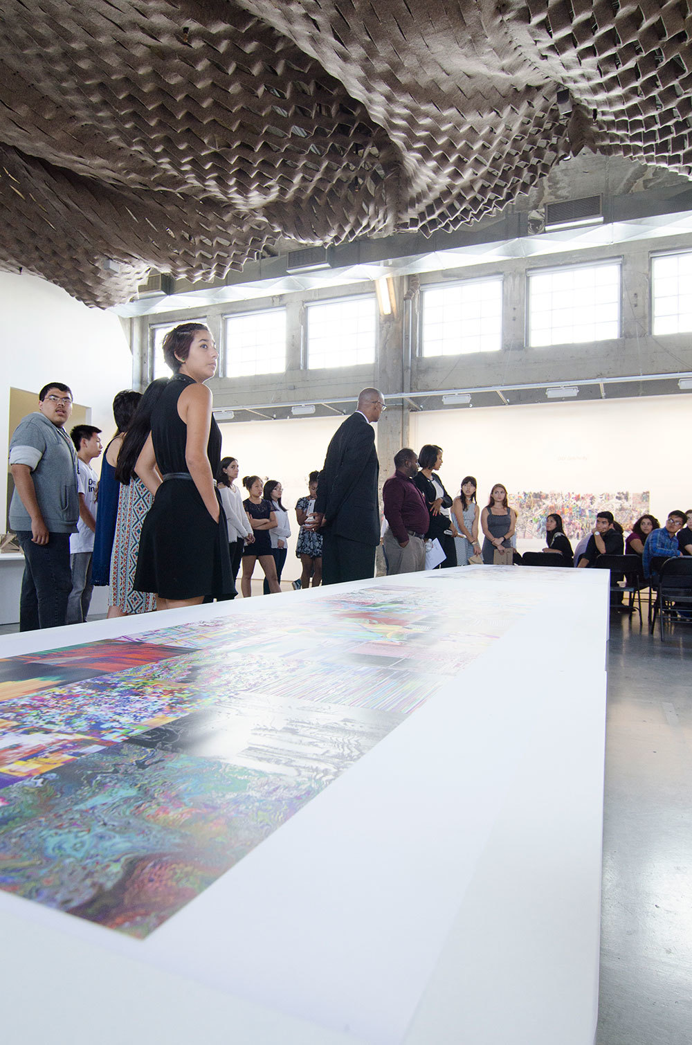 Architecture Enthusiasts admiring an architectural drawings