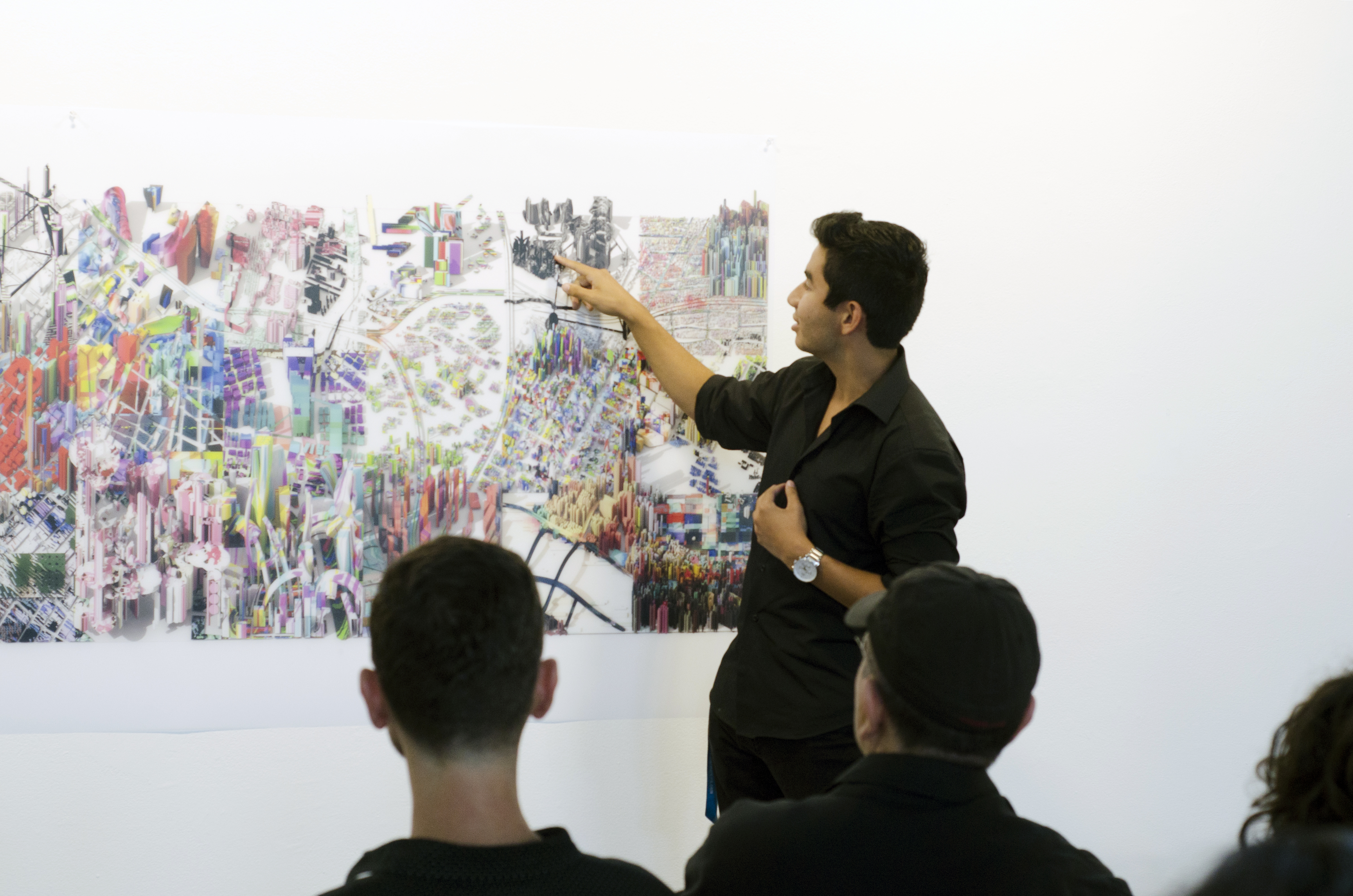 A high school participant presenting his project