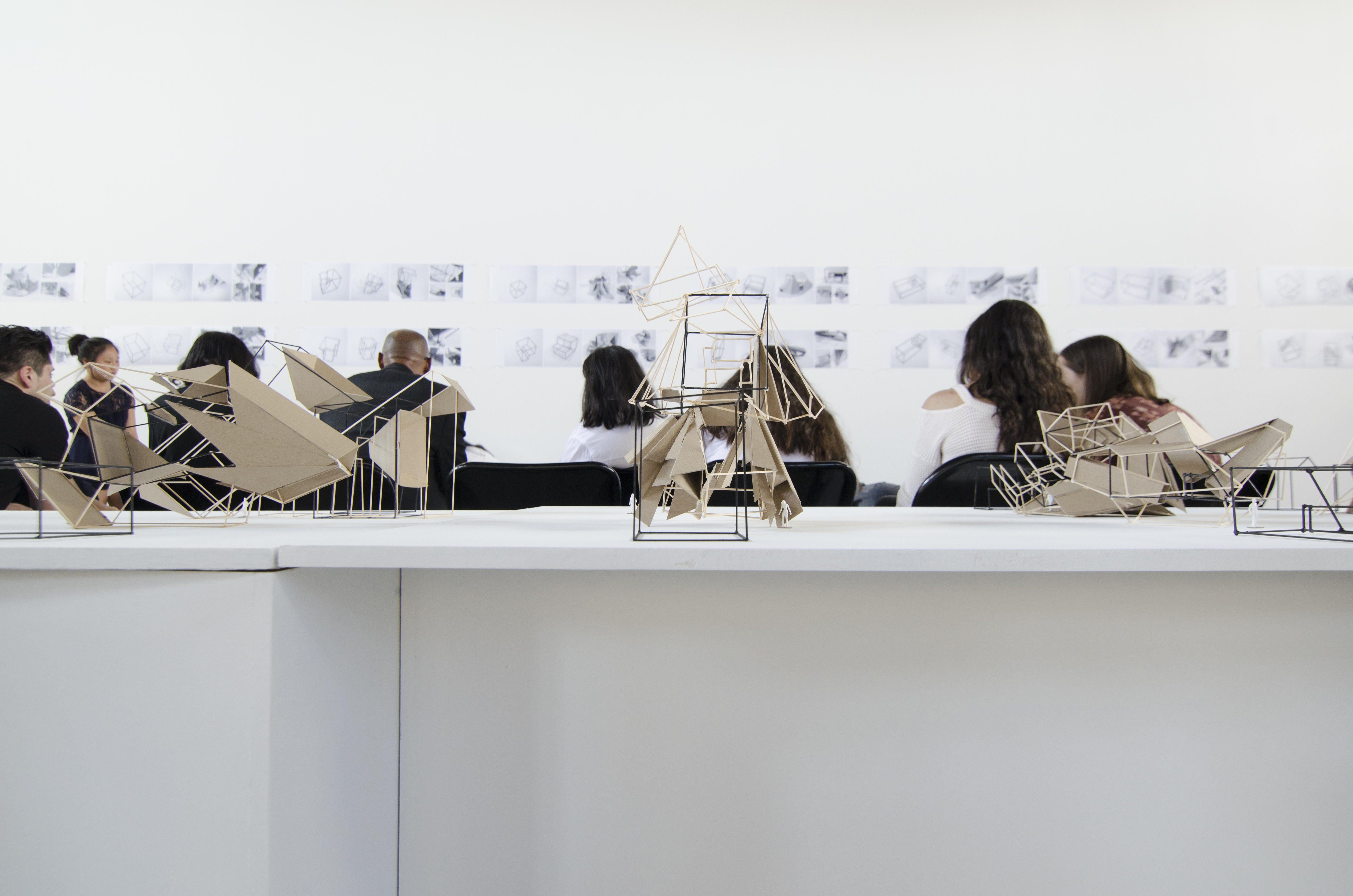 Architecture models made from sticks and paper exhibited