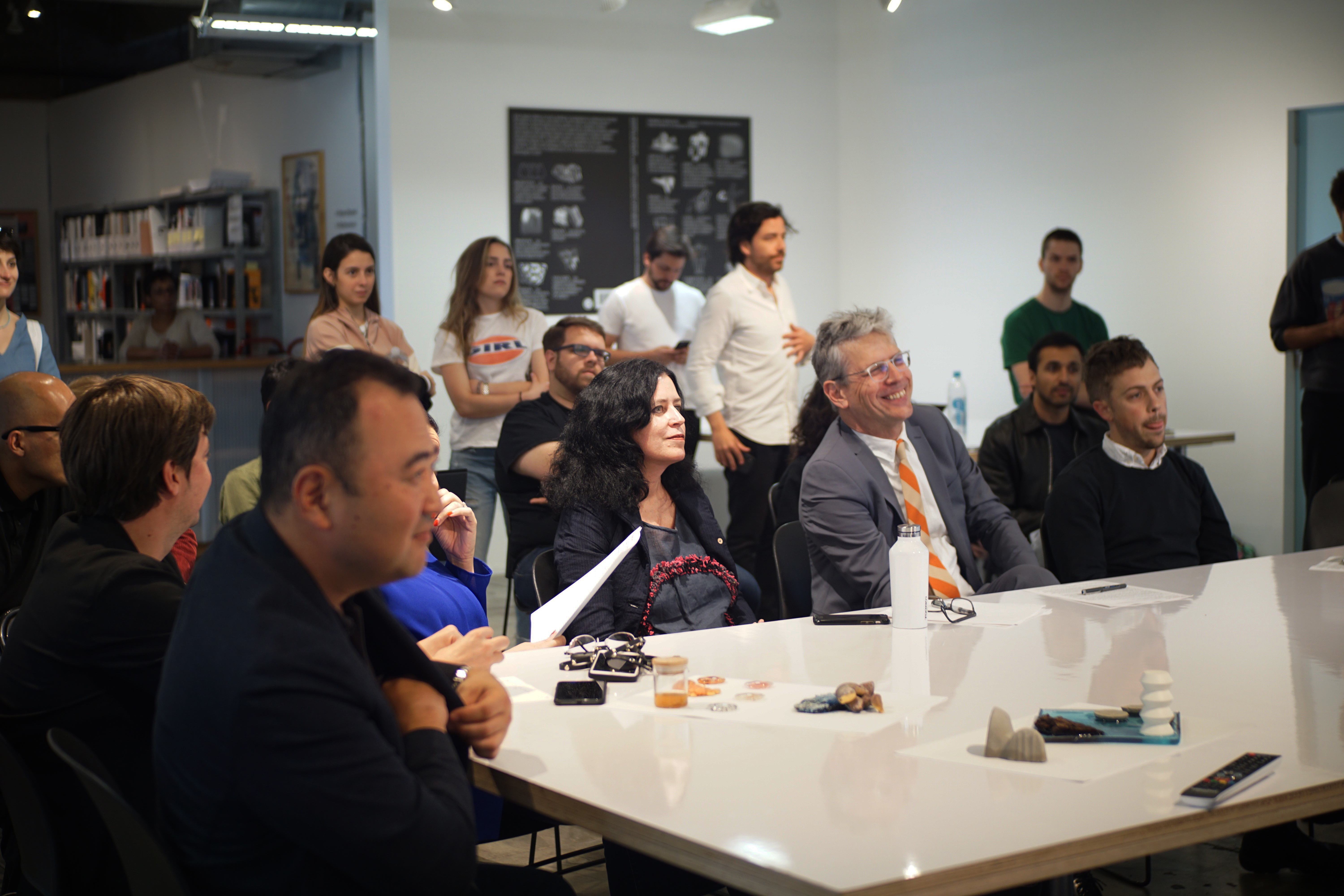SCI-Arc faculties and students listing to a presentation