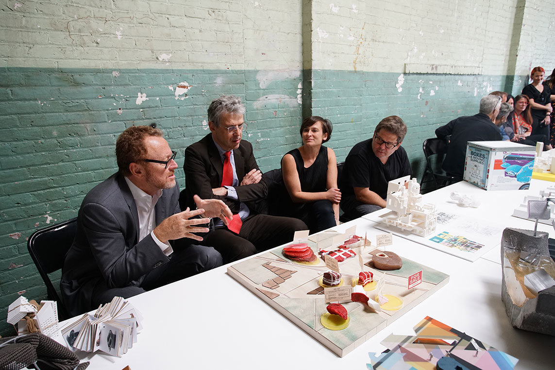 SCI-Arc faculties discussing over architectural models