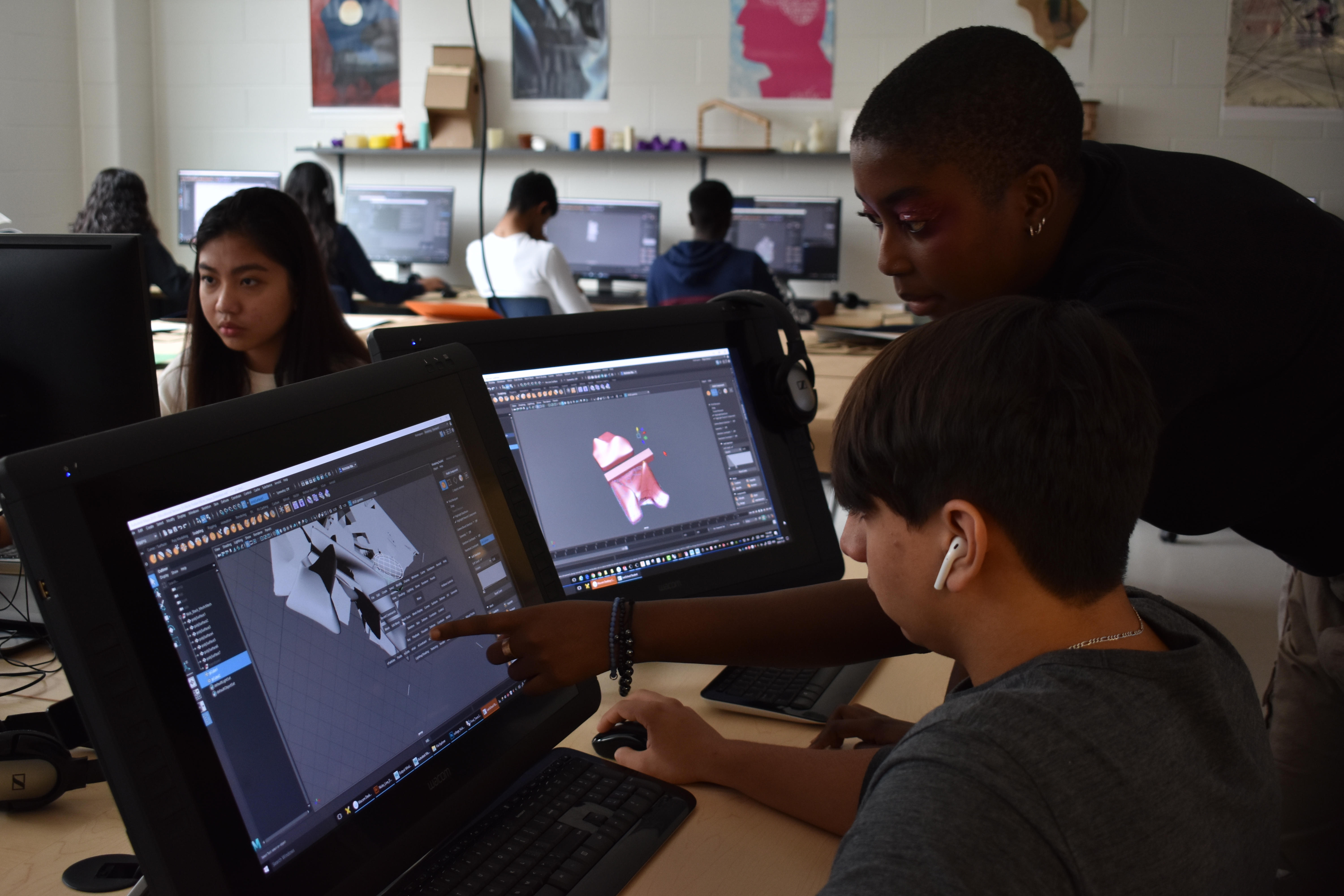 Students in classroom learning on computers