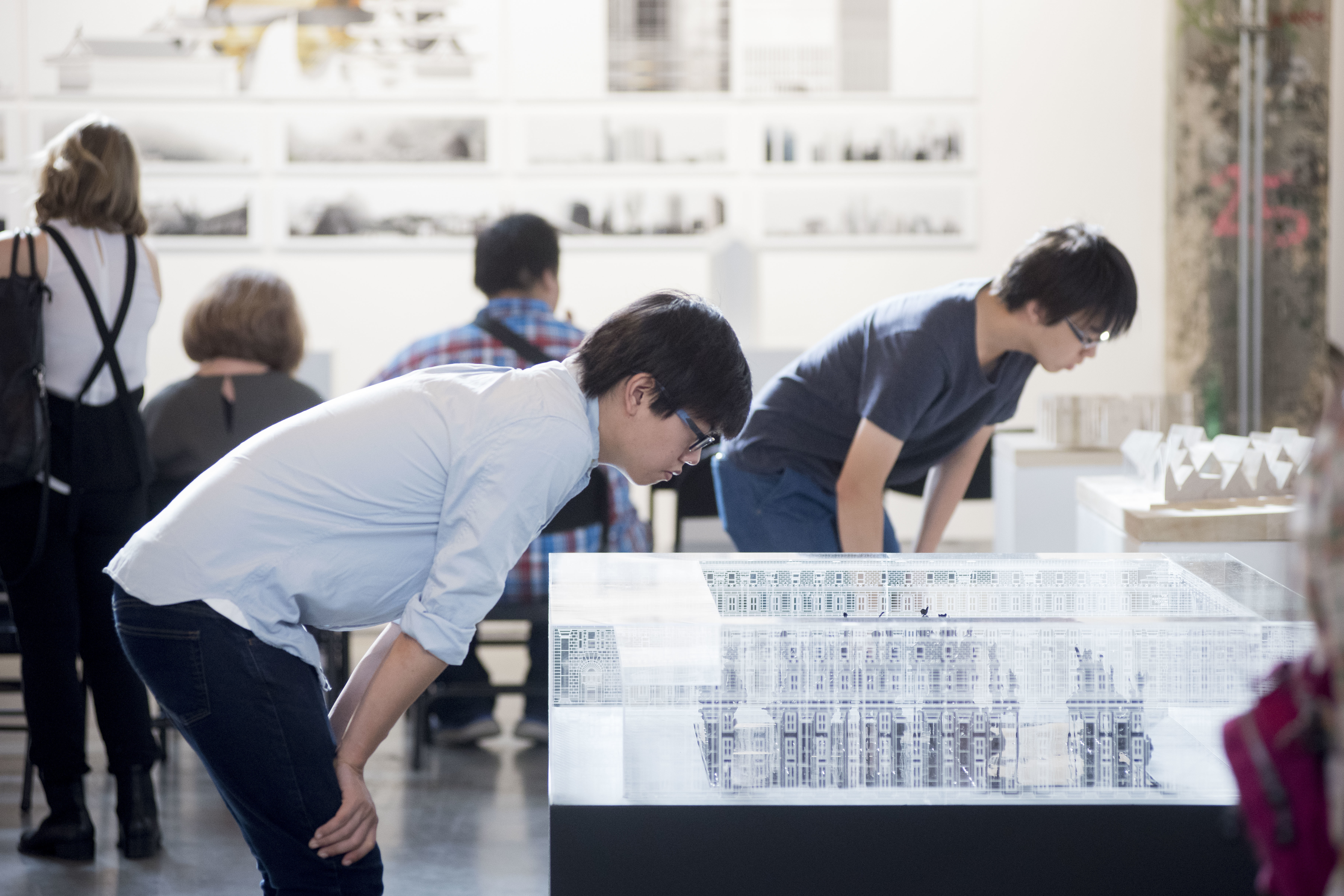 Architectural Enthusiasts admiring Architectural models