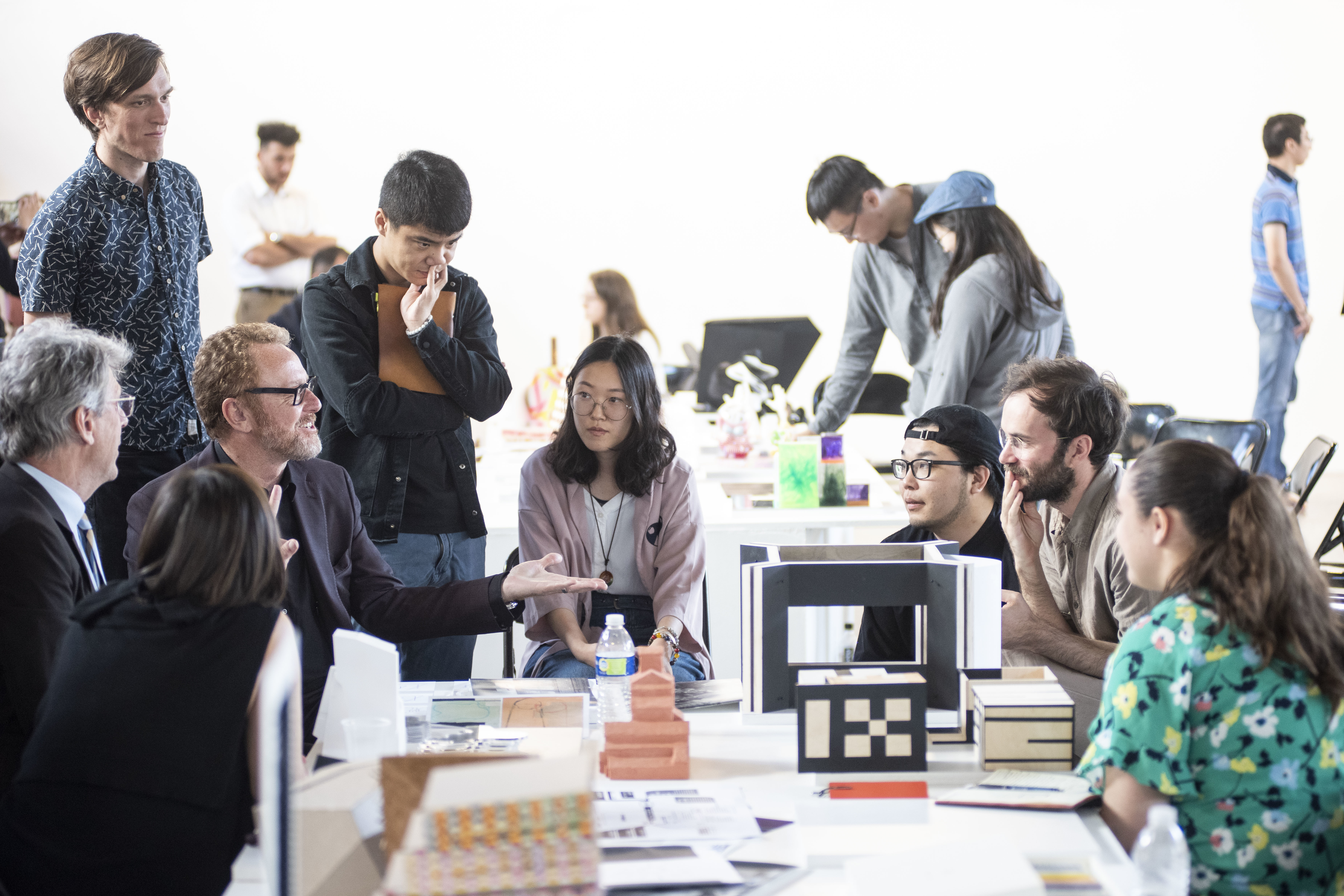 SCI-Arc faculties discussing over thesis miniatures