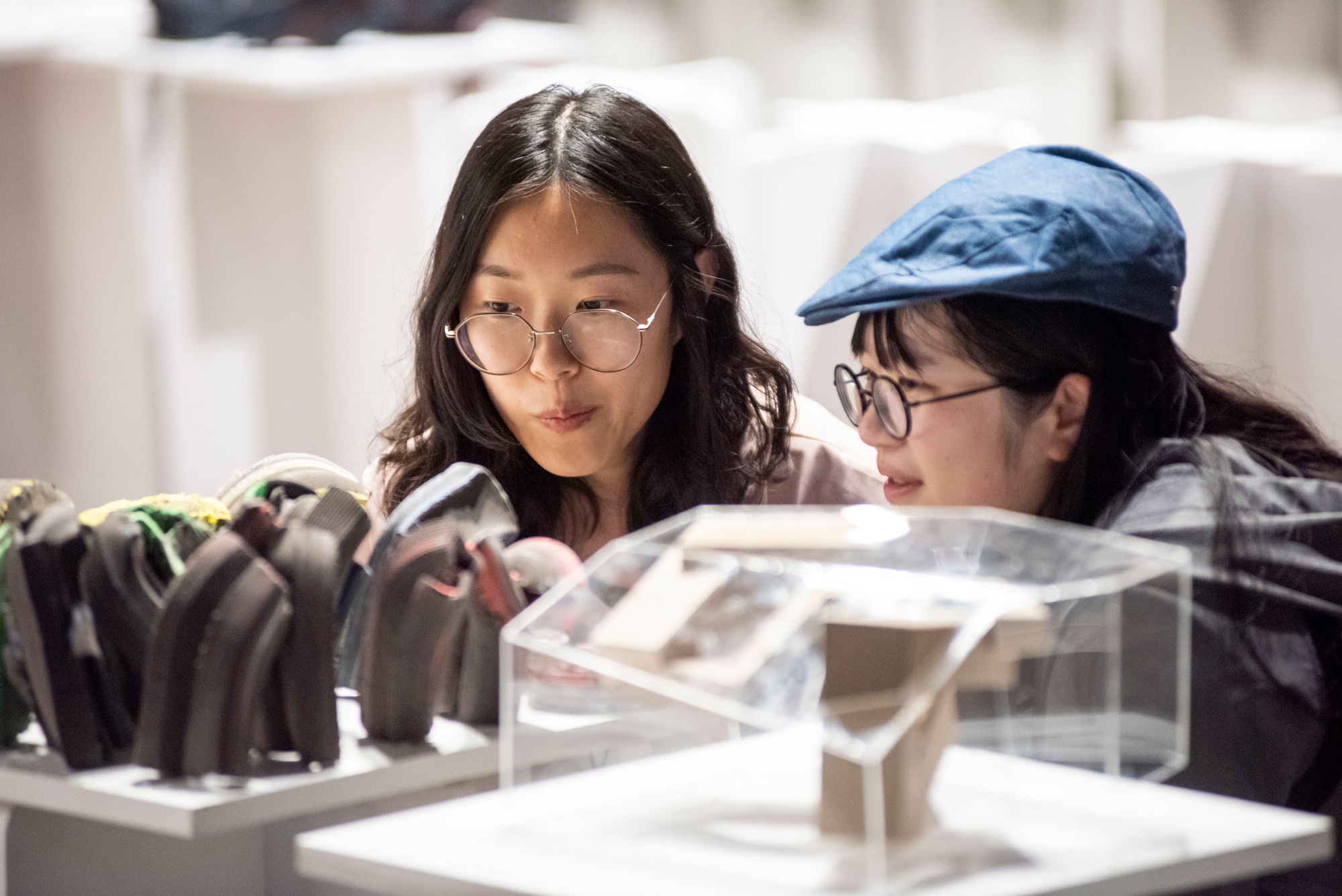 students looking at architecture model