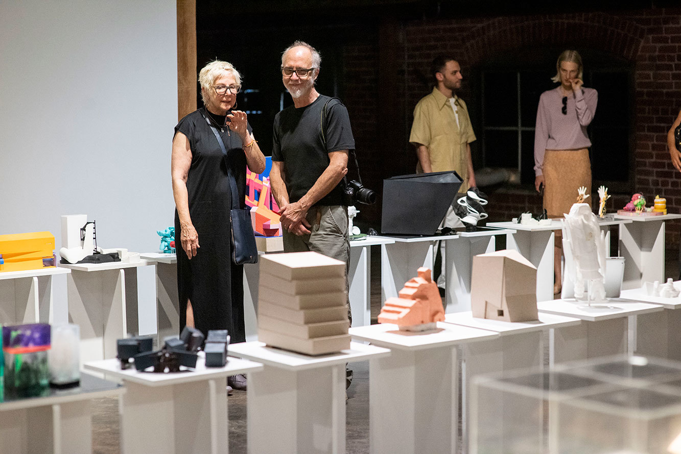 Architectural enthusiasts admiring Miniature models