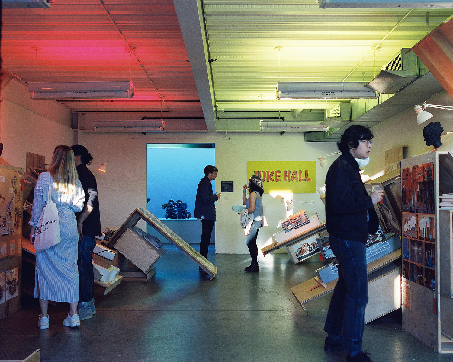 people looking around in architecture exhibition