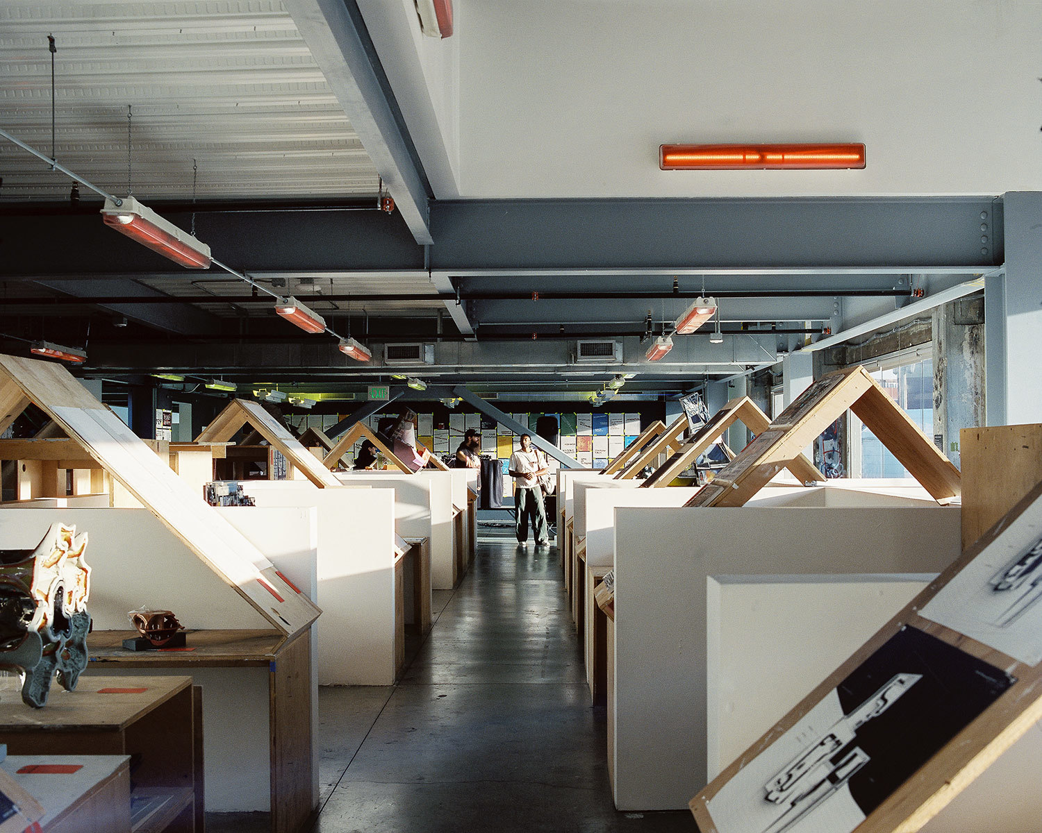 wood desk deconstructed and placed on top of each other in architecture school