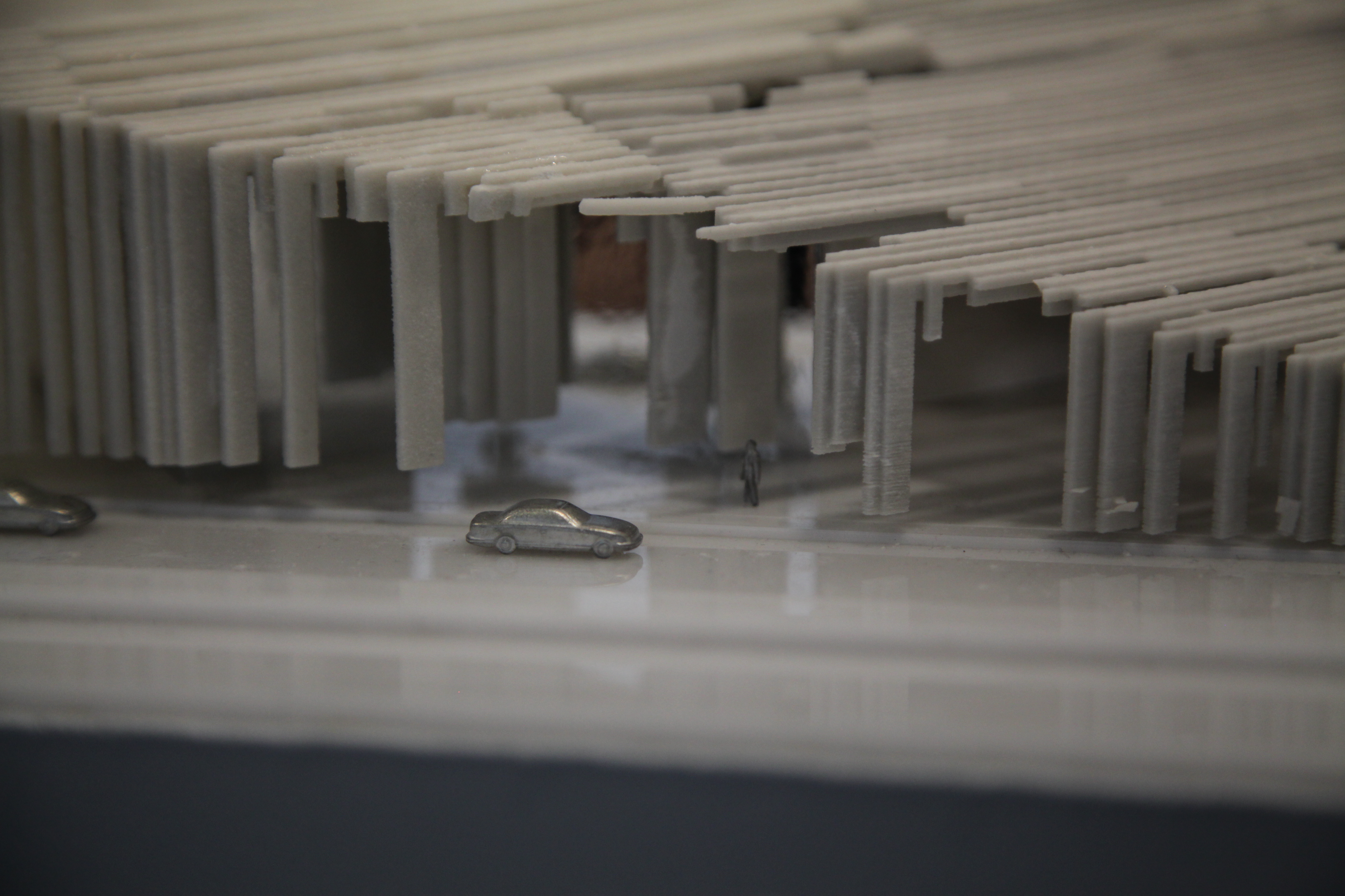 A close up of a grey architectural model