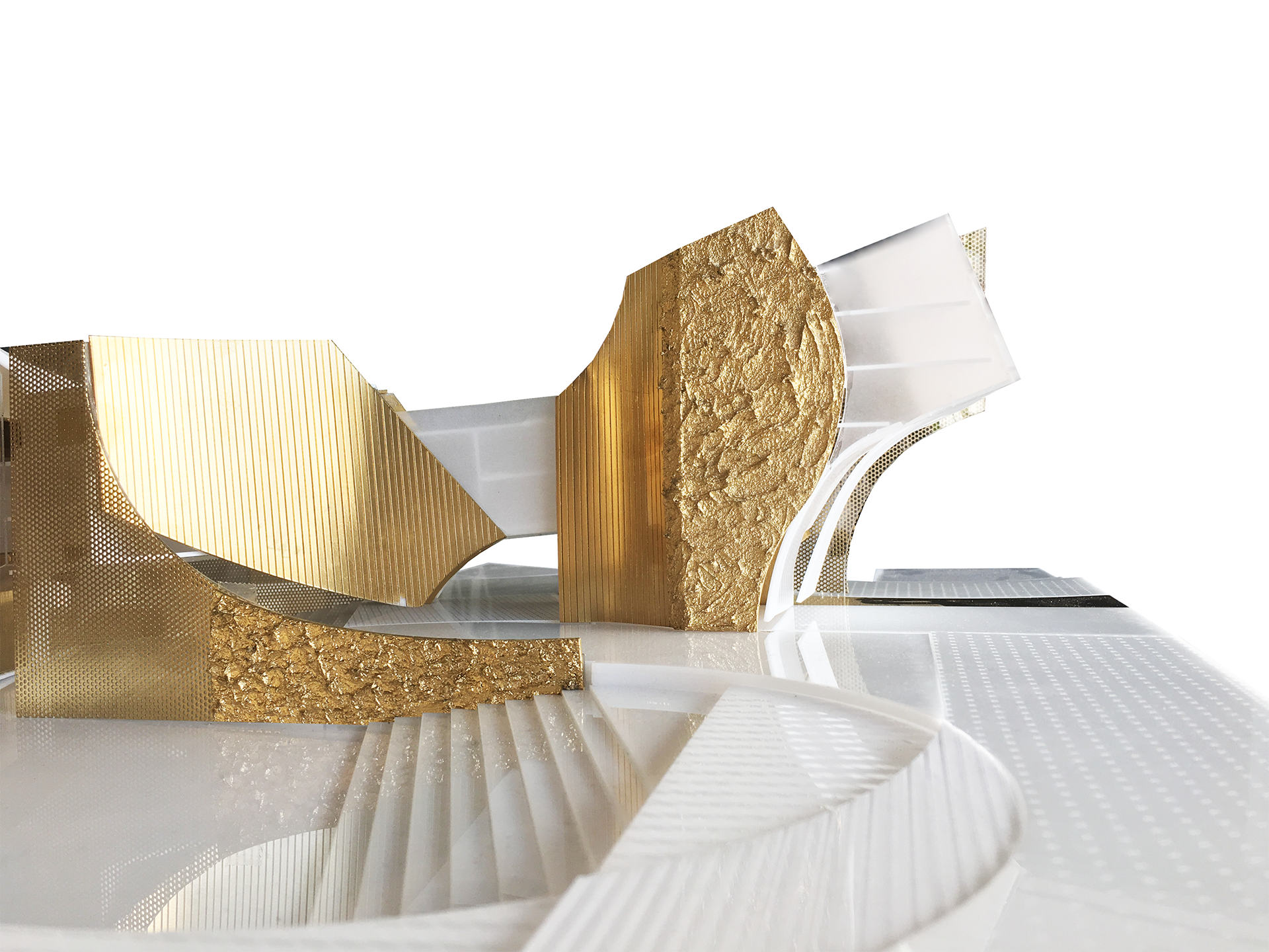 A white architectural model with golden mesh skin