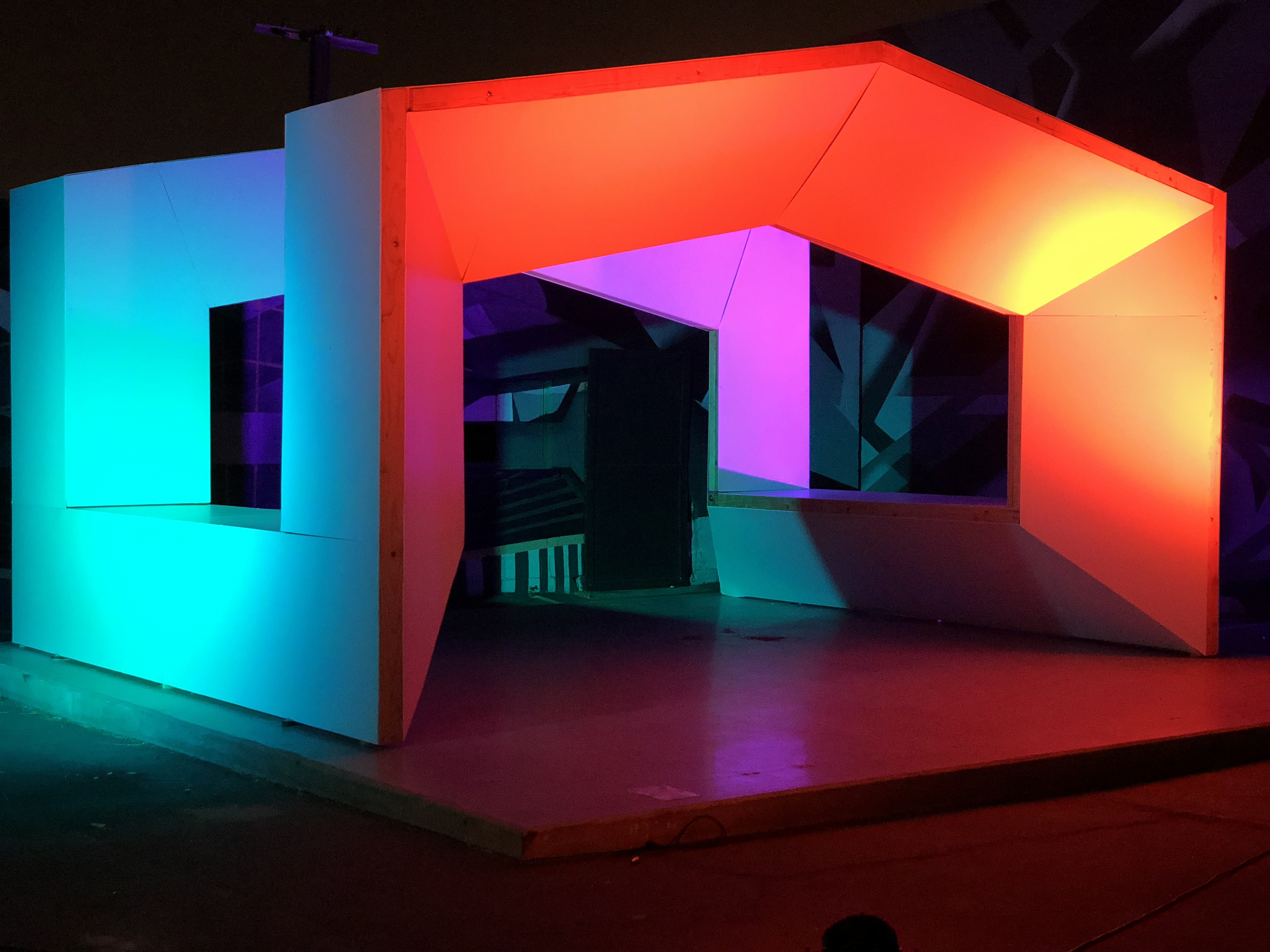 a multicolored projection on House pavilion