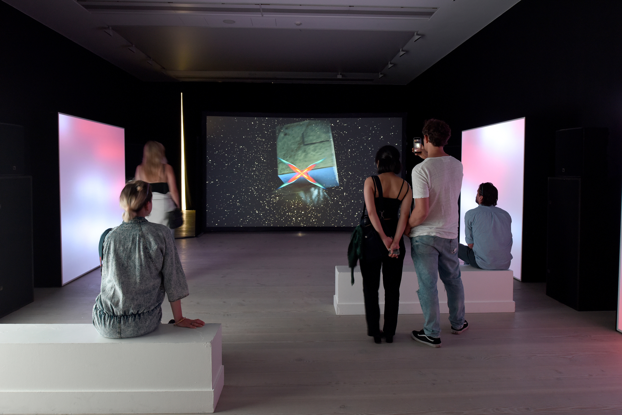 people in a video exhibition