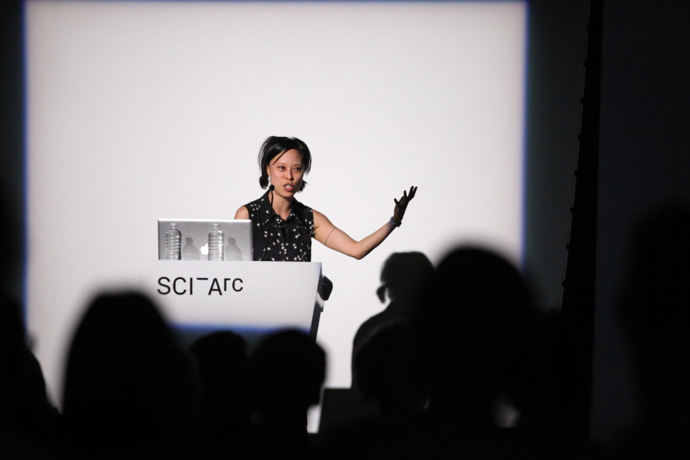 woman at podium giving lecture