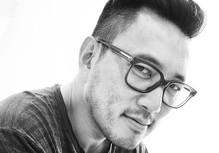 black and white image Minsuk Cho with glasses