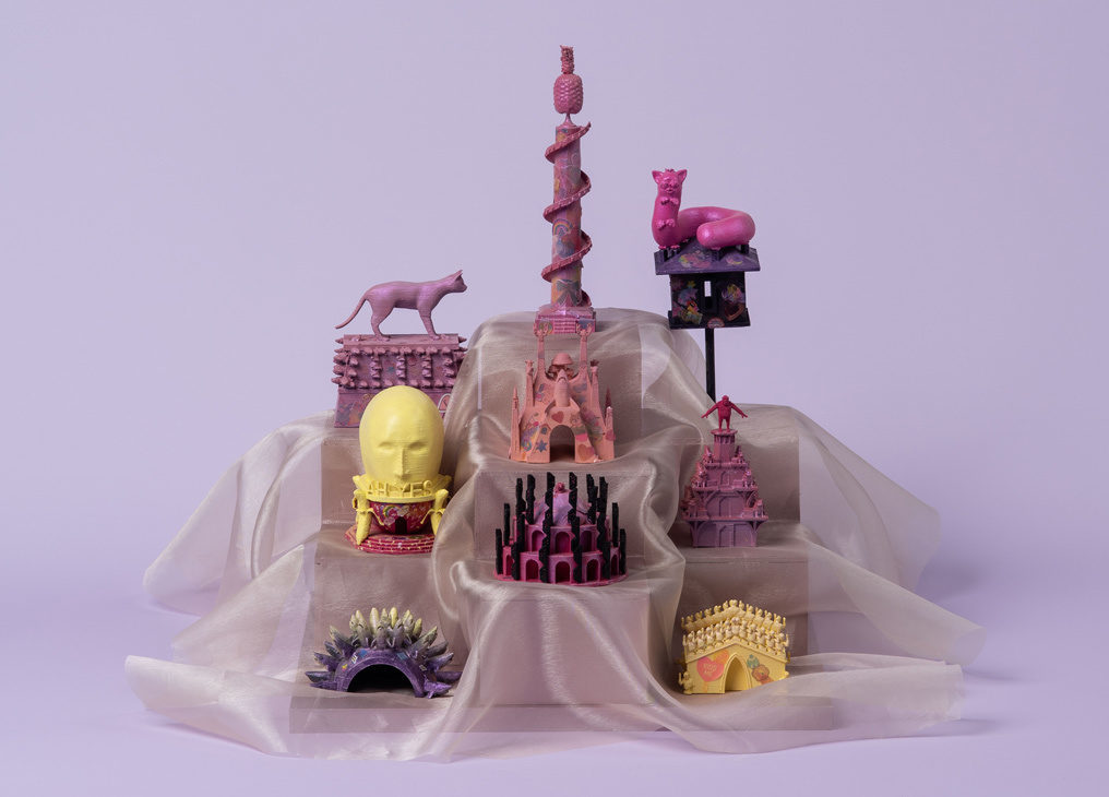 architecture model with fabric and mini shrines lavender background