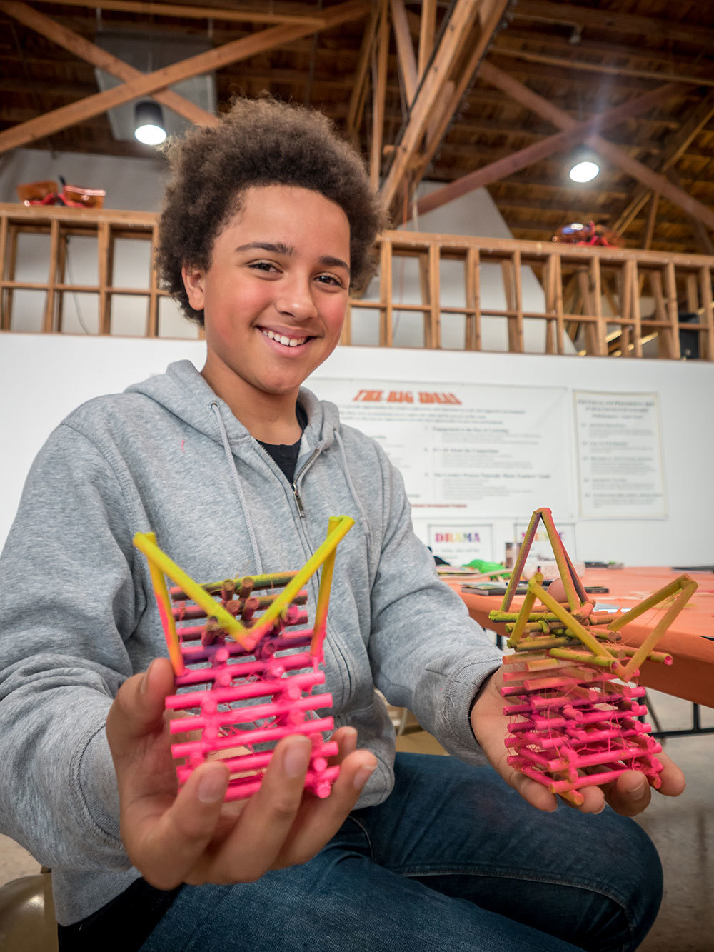 Inner City Arts student holding architectural model