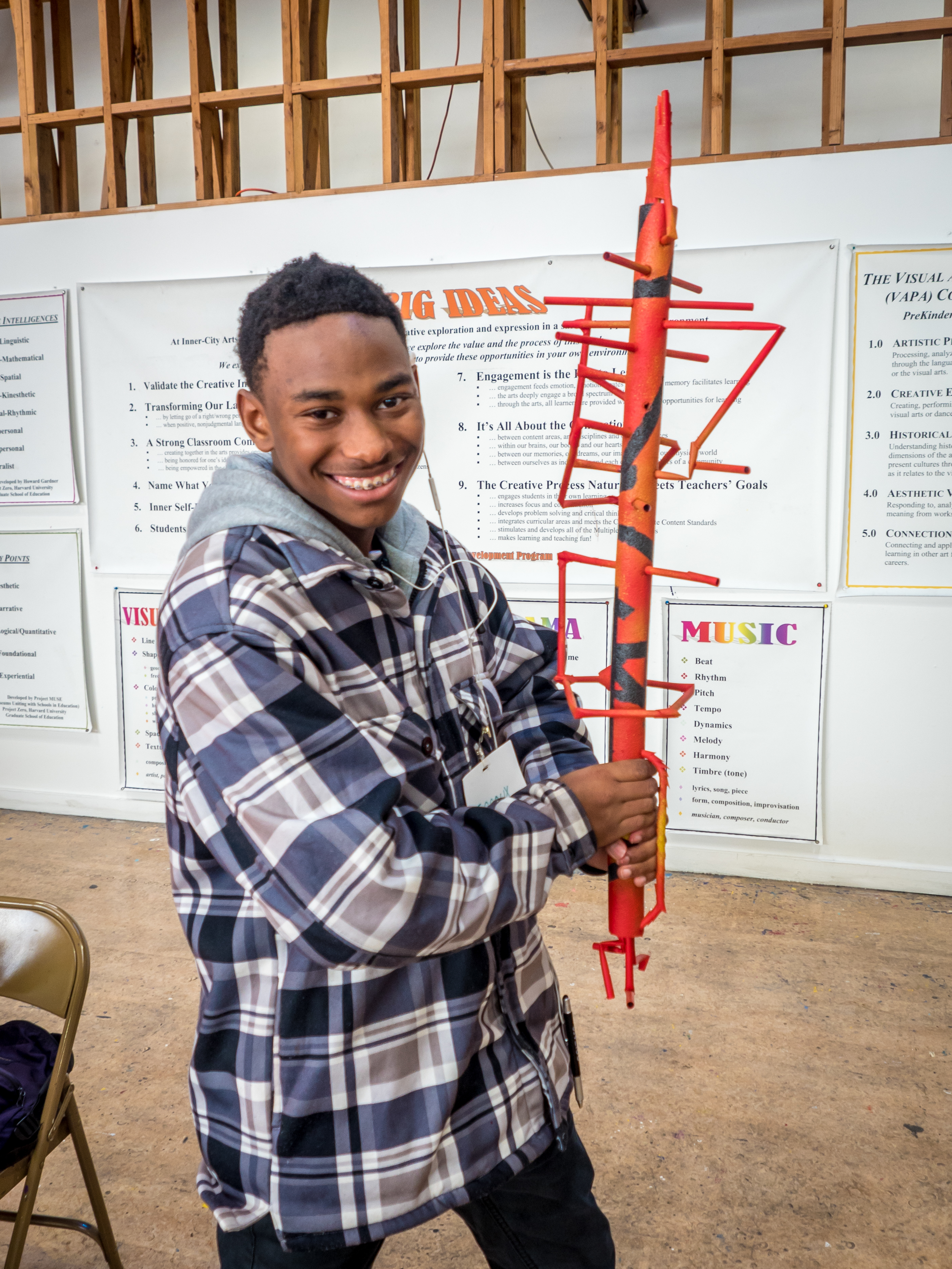 Inner City Arts student holding architectural model