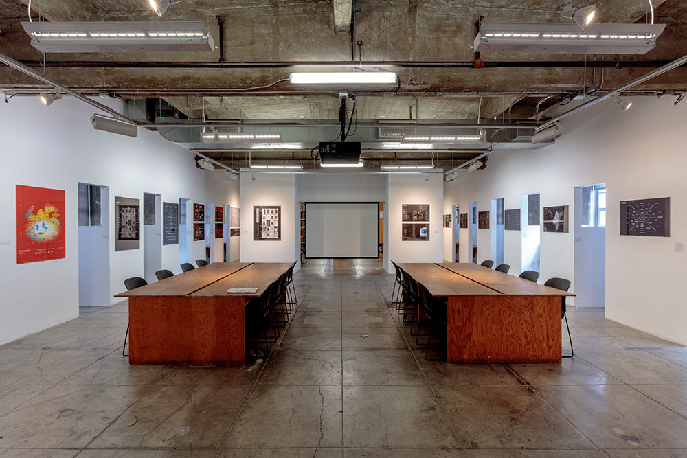 sciarc library cubicles parrellel stained wood conference table