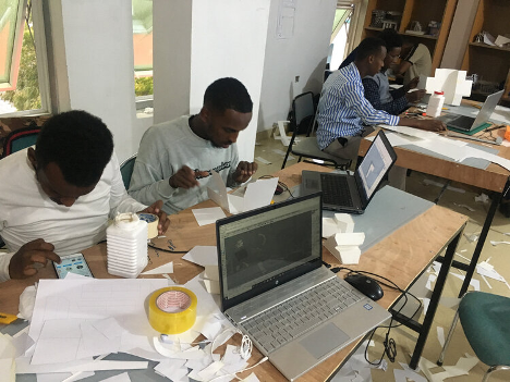 students working desks computer