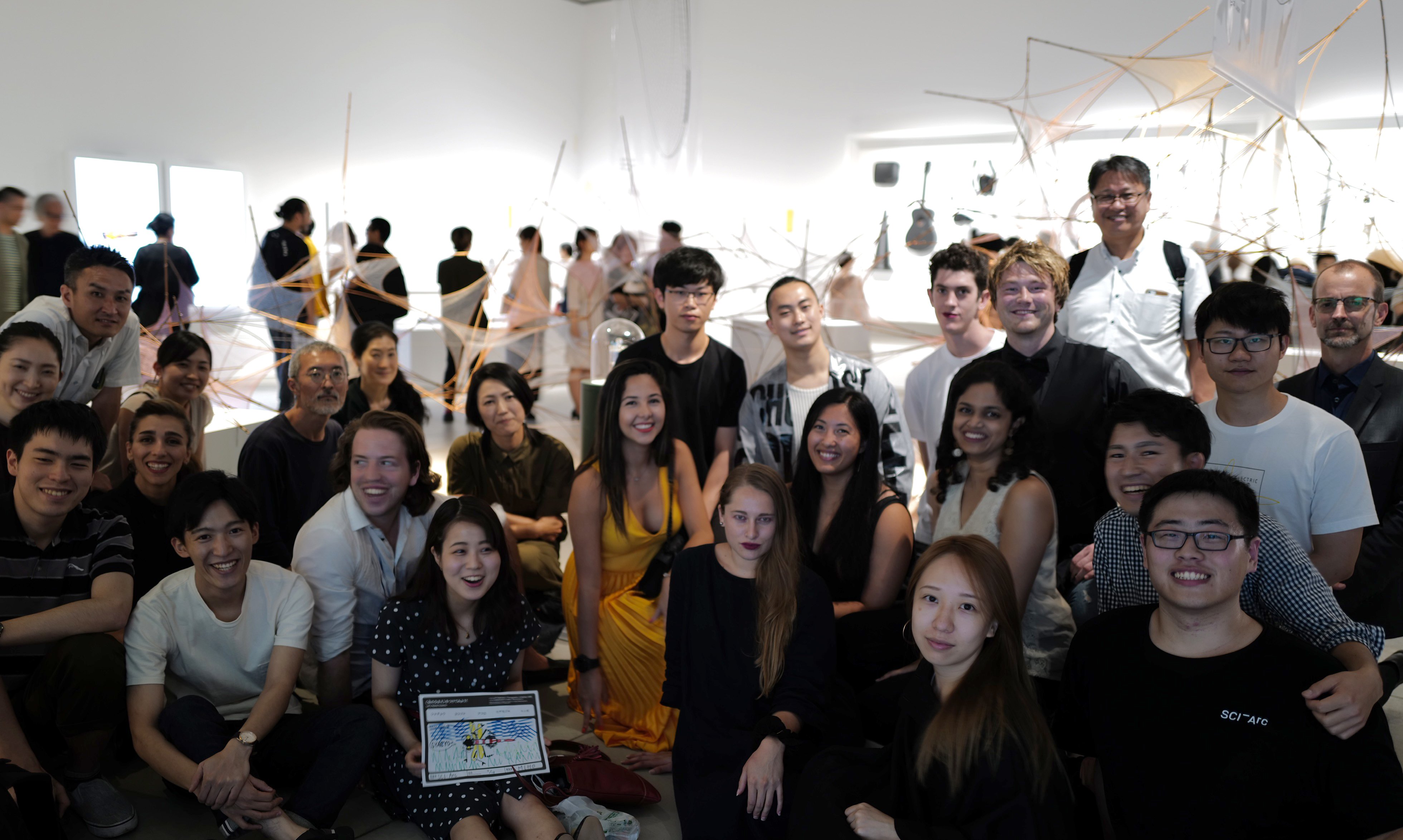 student group photo at exhibition opening