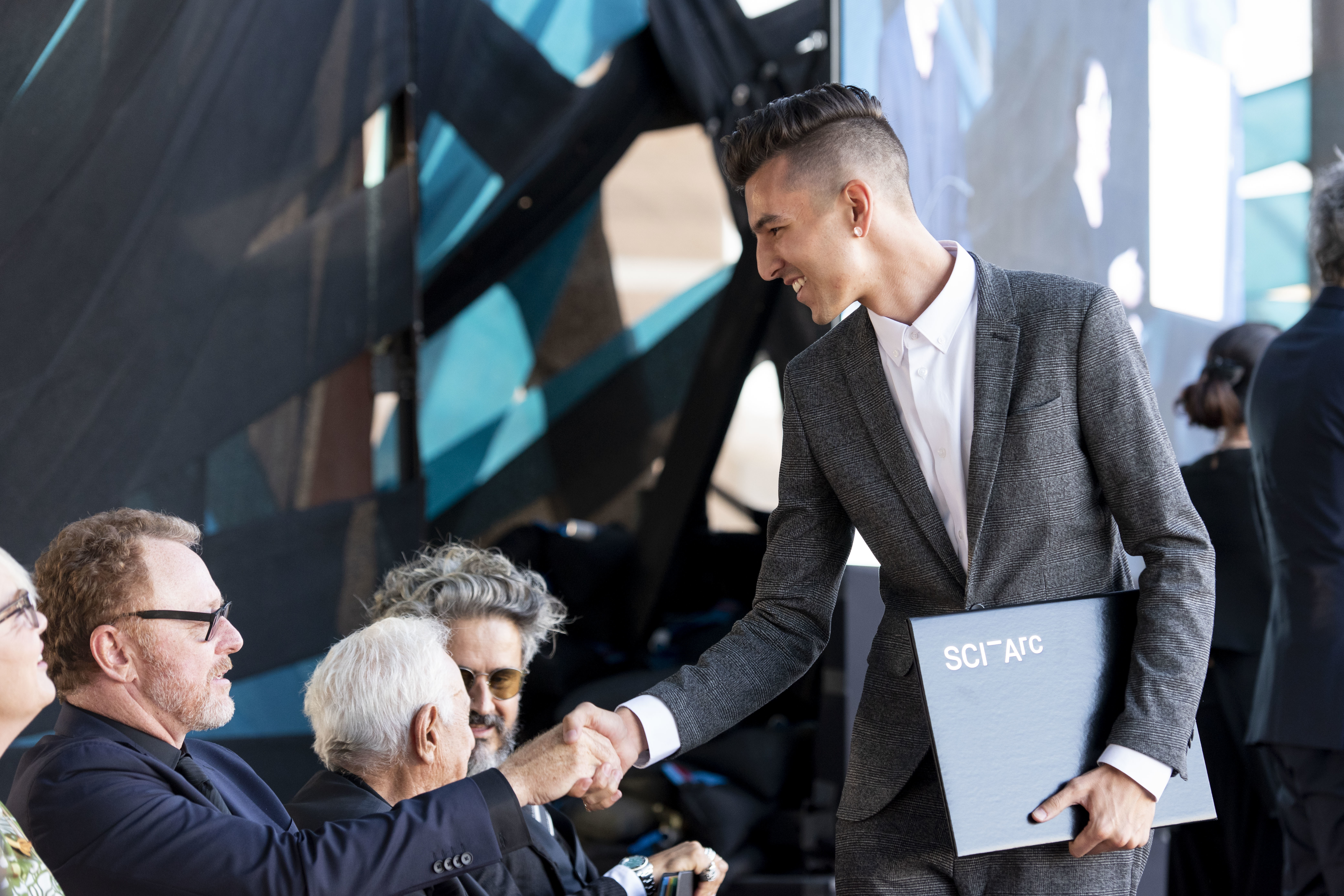 photograph of student graduating