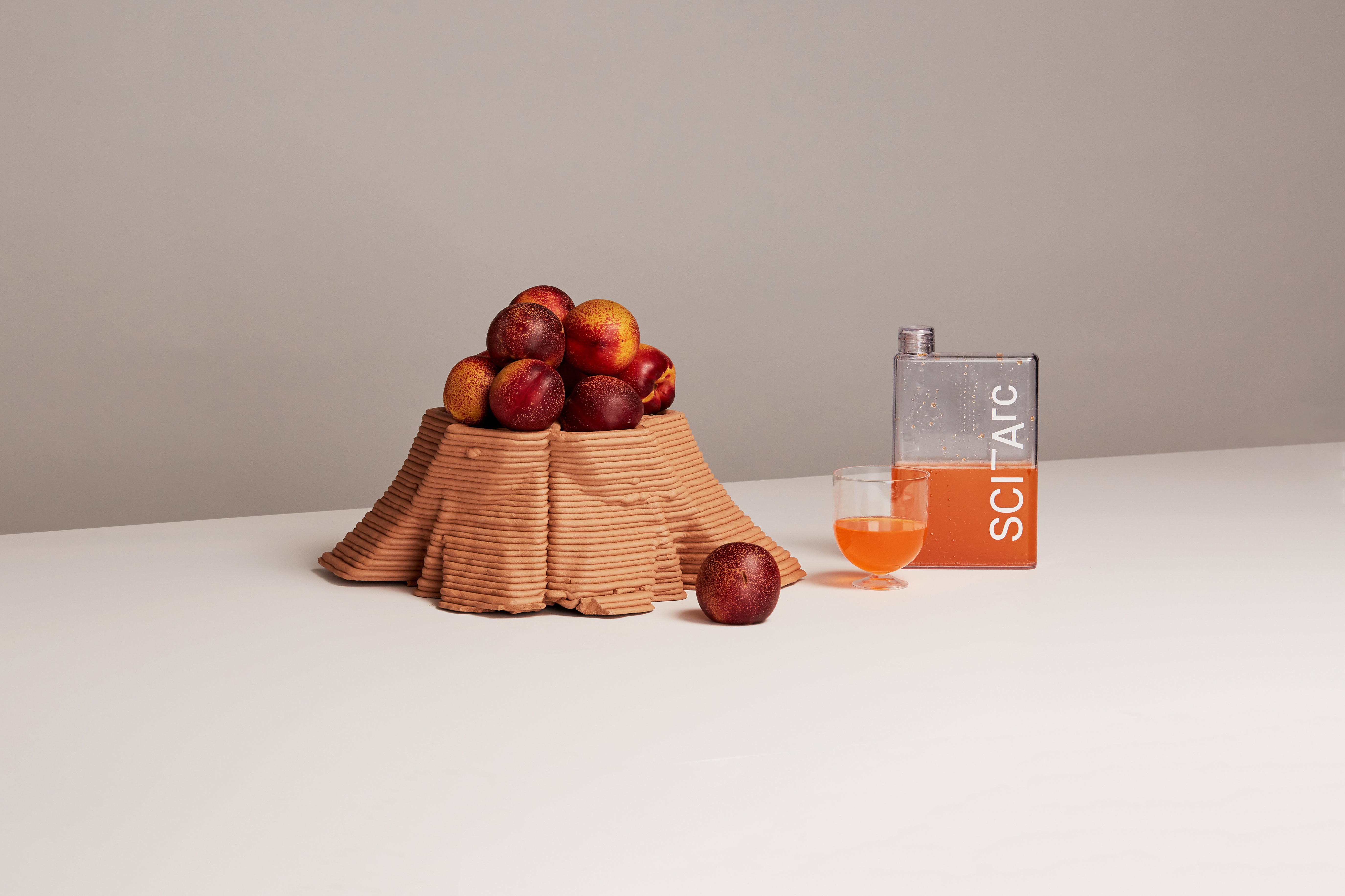 sciarc water flask still life with fruit juice