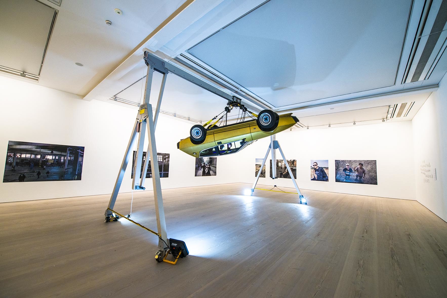 Saatchi gallery car hangs in room