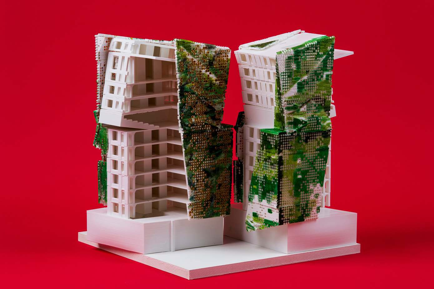 architecture model white with green side red background