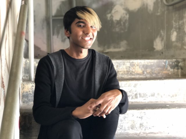 student portrait on stairs