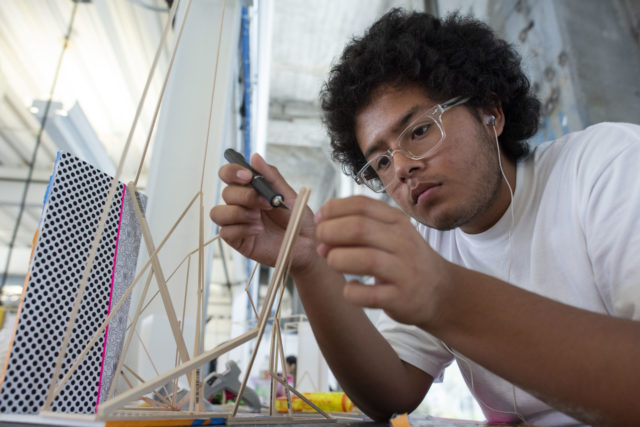 closeup of student working on model