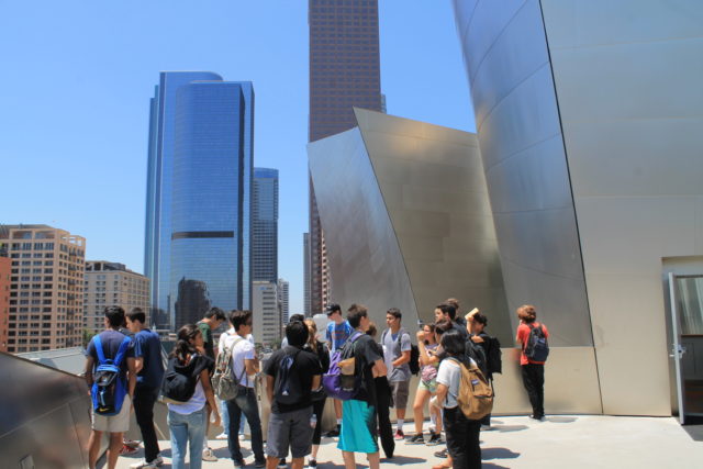 students exploring walt disney concert hall patio