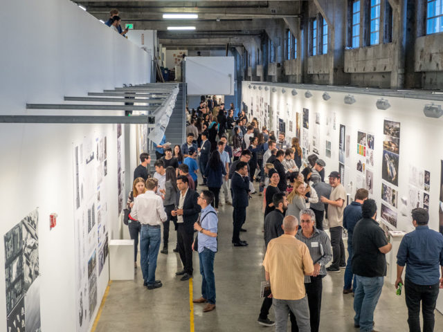 students presenting work in south gallery