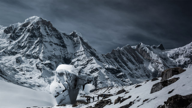 snow covered mountain scape with camoflauged architecture