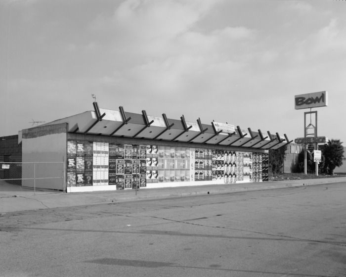 black and white photo building exterior street