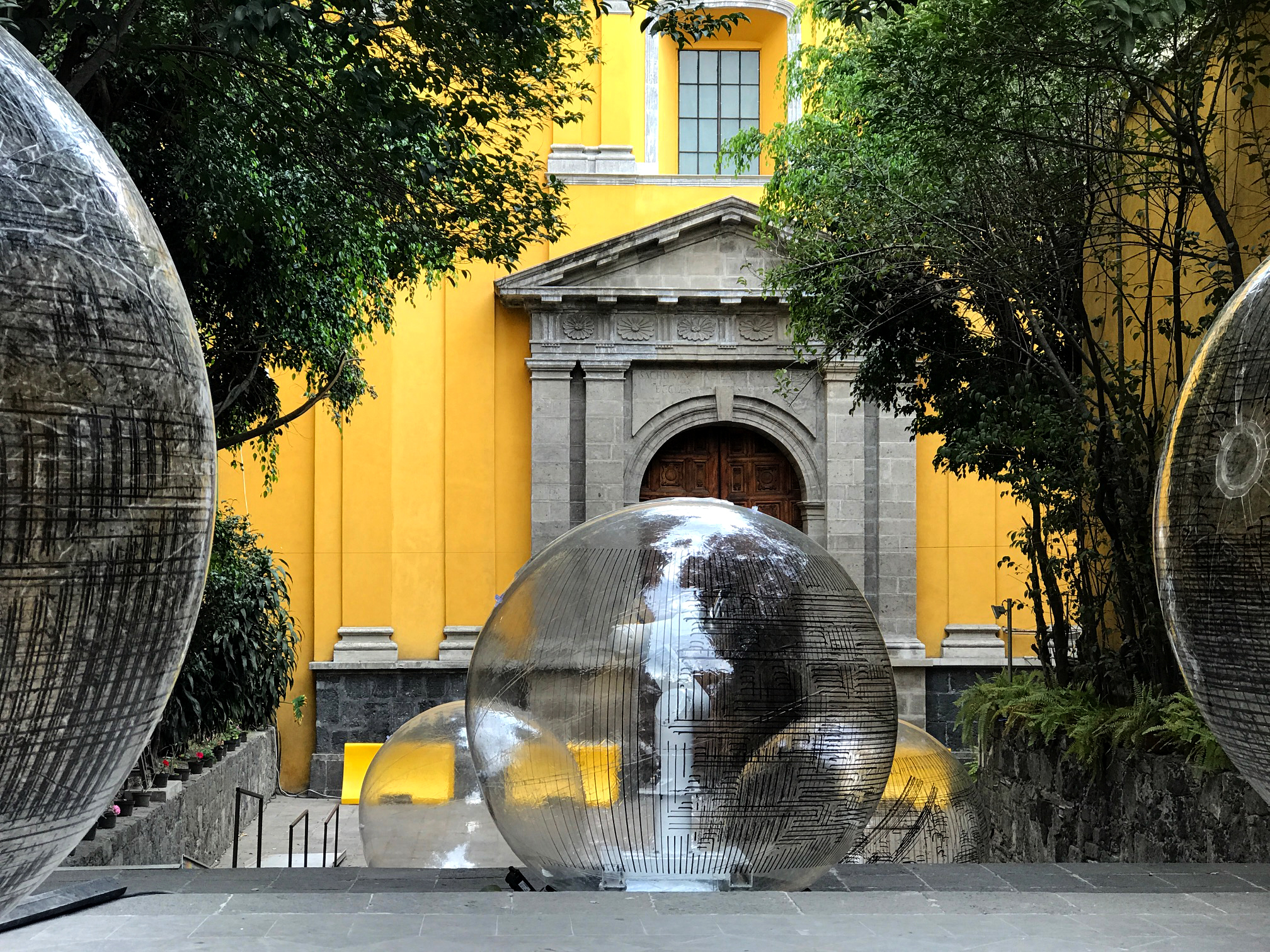 a robotic arm inside a clear sphere