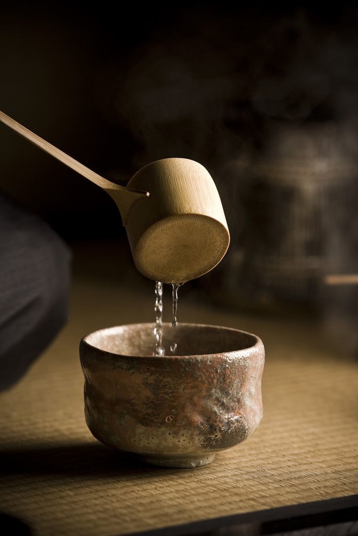 japanese chawan tea bowl ladle pouring water